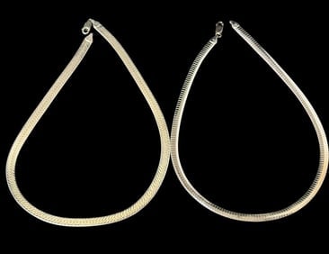 Italian Sterling Serpentine Necklaces: Pair of Italian sterling serpentine style necklaces. Marked .925. 1) Measures 17" and is 3/16" wide. Weighs 26g. 2) Measures 18", measures 1/4" and weighs 28g.