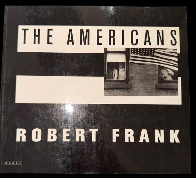 Book: The Americans by Robert Frank: Softback book the Americans by Robert Frank. Third edition 1995. Measures 9" x 8" x .5".