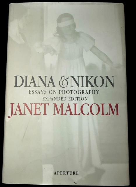 Hardback Book - Diana & Nikon Essays on Photography: Hardback book - Diana and Nikon Essays on Photography. First Expanses Edition by Aperture Publisher. 1997. Measures 1" x 5.75" x 8.5".