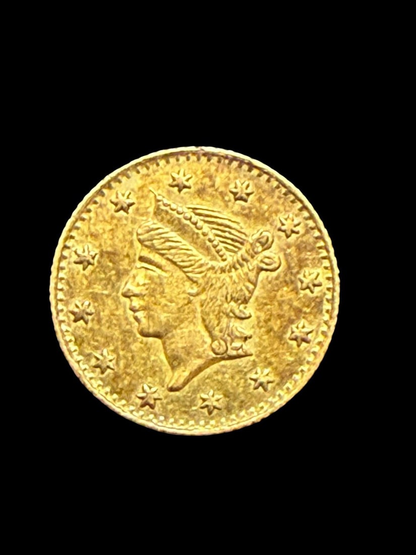 US One Quarter Fractional Gold Dollar Currency: US one quarter fractional gold dollar California currency. No date. Circulated. Ungraded. Very good condition.