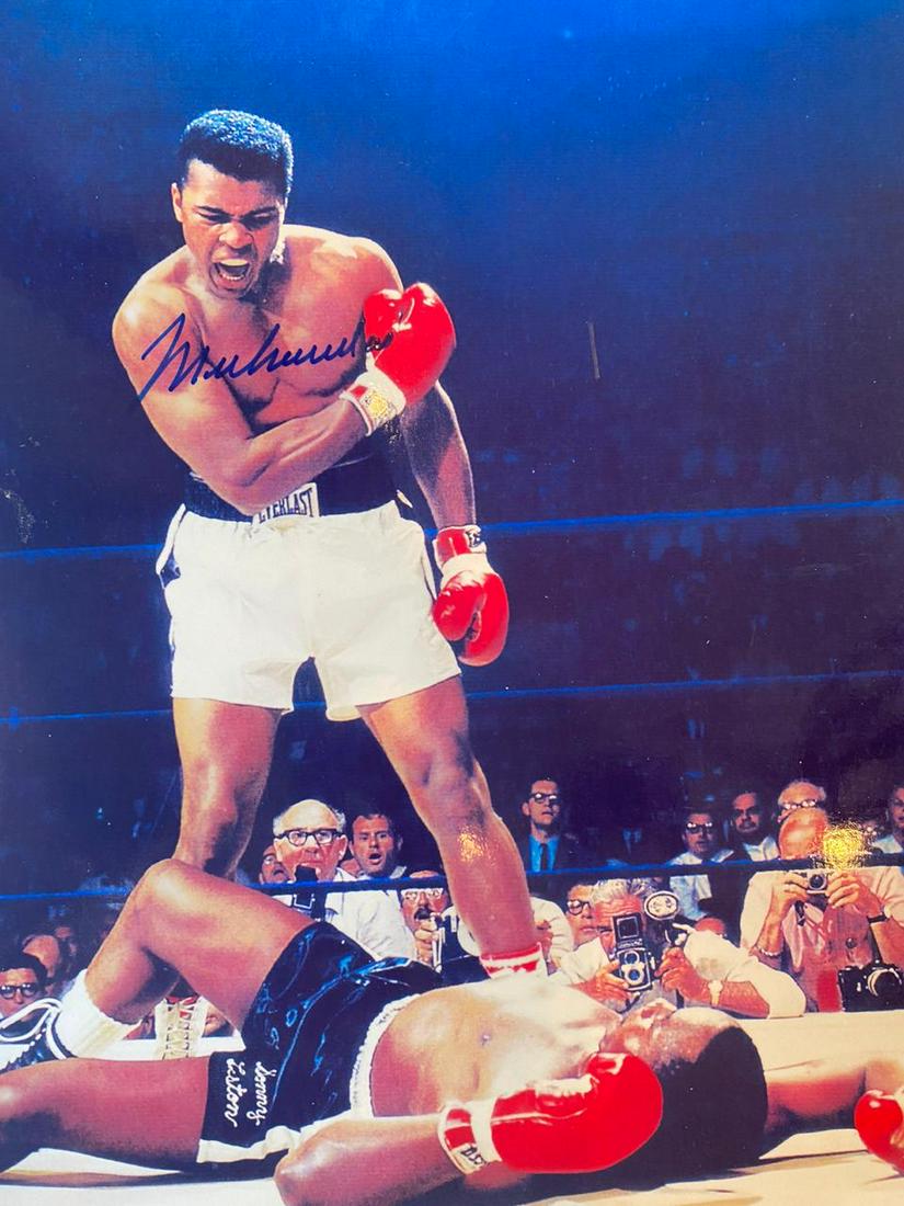 Autographed Muhammad Ali Knock Out Photograph: Autographed Muhammad Ali Knock Out (One is damaged) Medium: Autographed Photograph