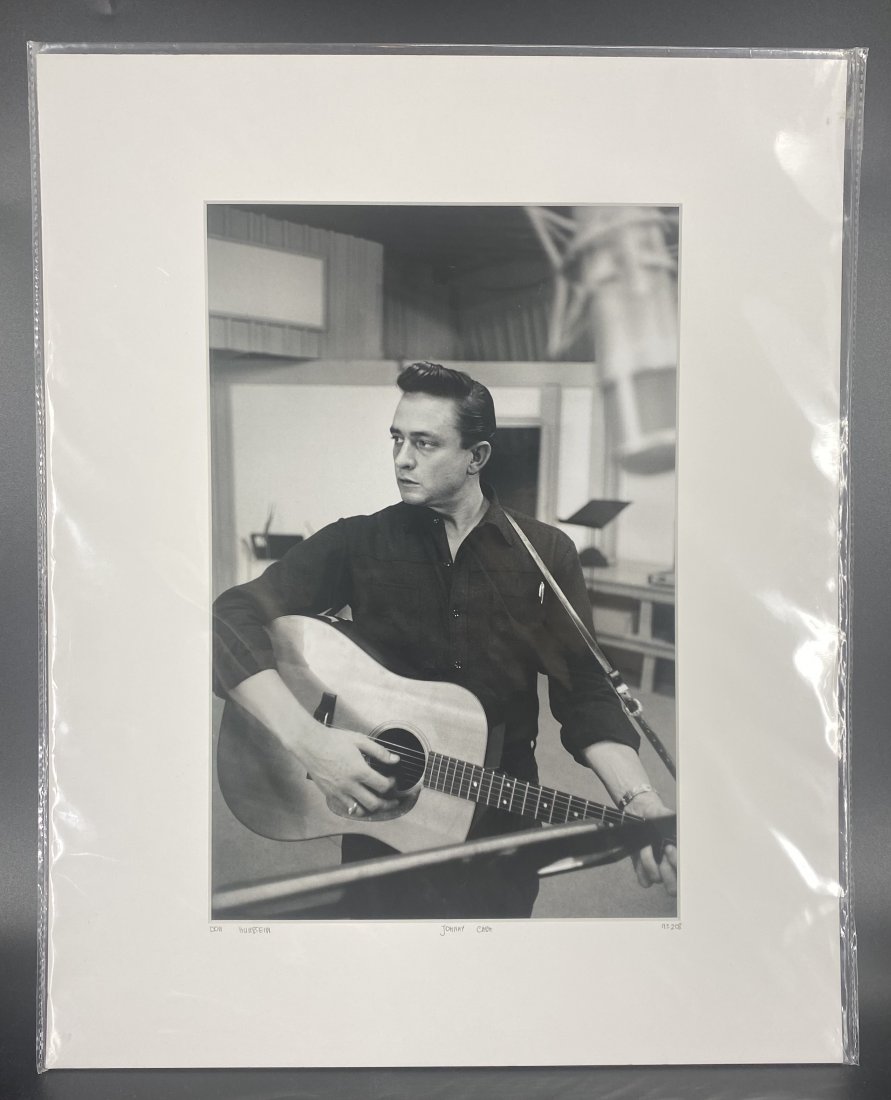 Don Hunstein Johnny Cash L/E Photograph COA Numbered: Photographer: Don Hunstein Title: Johnny Cash Celebrity: Johnny Cash Certificate of Authenticity from YellowKorner affixed to the back Matted Dimensions: 16 x 20 Protected with Clear Mylar Sleeve (as 
