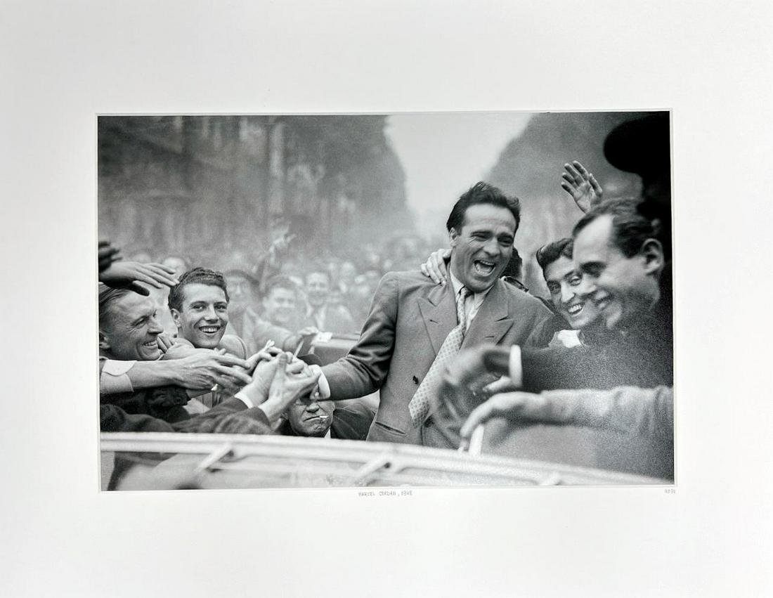 Marcel Cerdan 1948 Presse Sports Yellow Korner Certified Photograph: Marcel Cerdan 1948 Presse Sports Yellow Korner Certified Photograph Certificate of Authenticity from YellowKorner affixed to the back Matted Dimensions 16"x20" Protected with Clear Mylar Sleeve (as pi