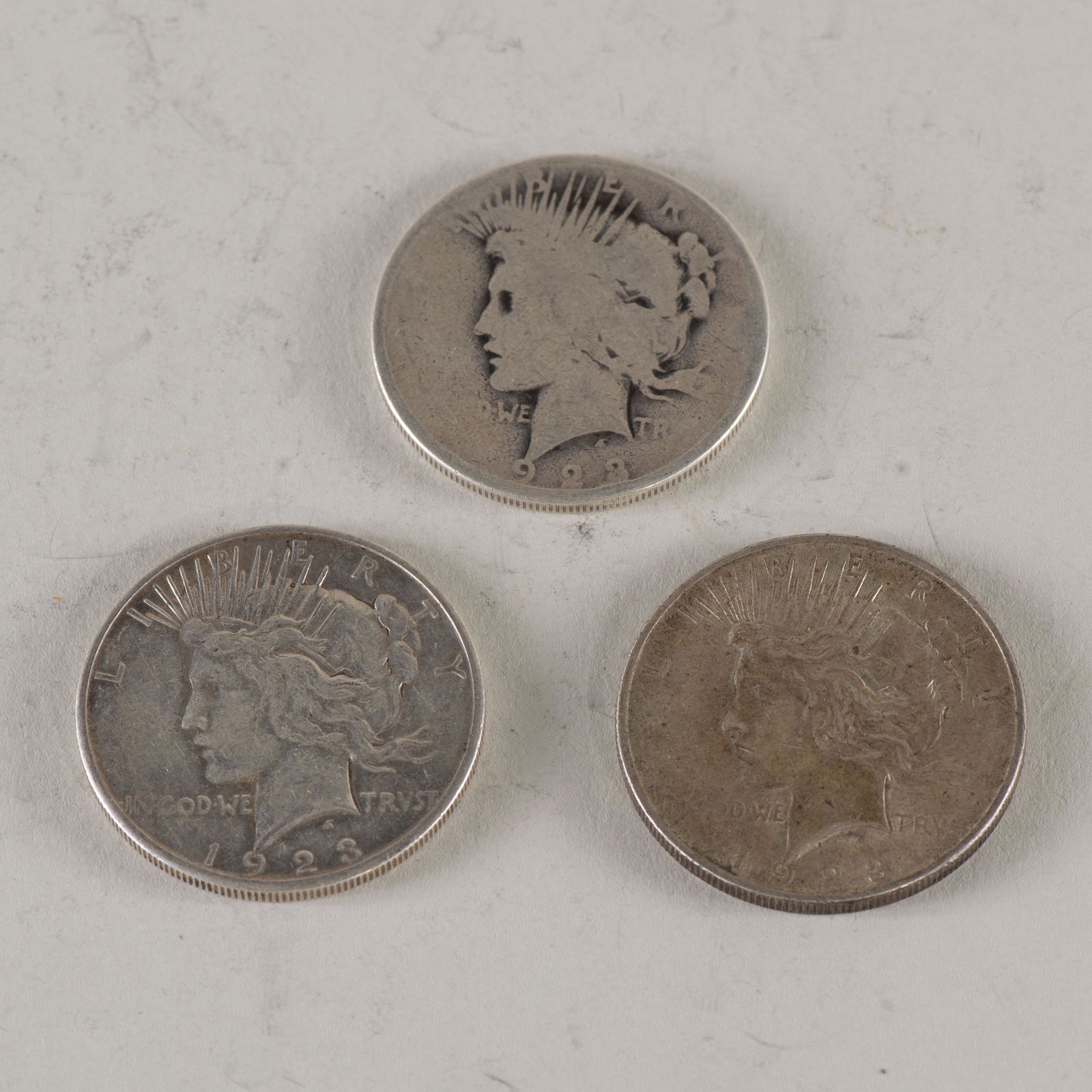 (3) peace silver dollars (1 of 2)