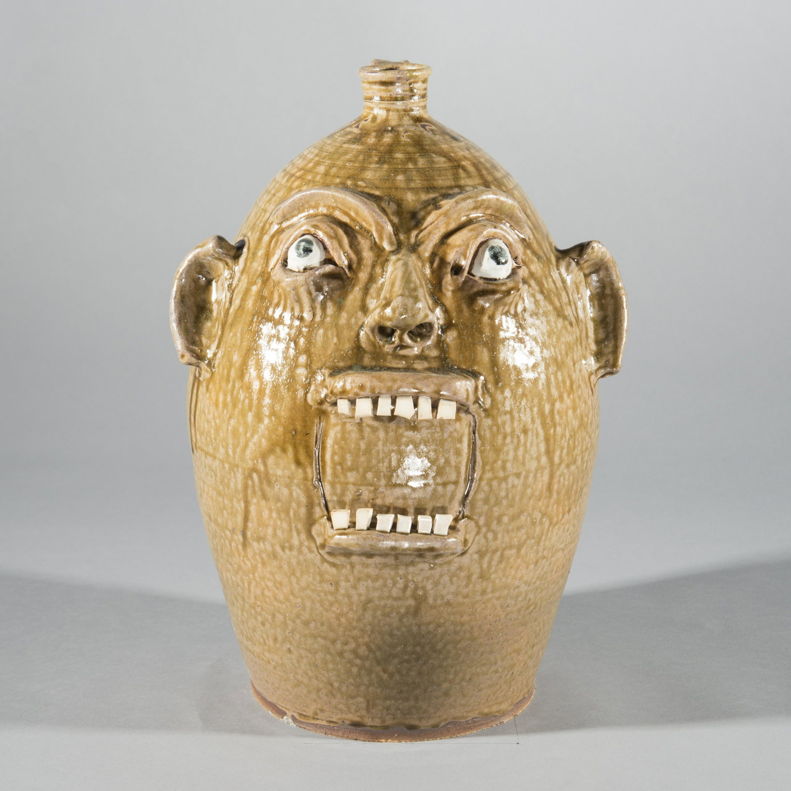 Marvin Bailey LARGE 15" Face Jug: Marvin Bailey (born 1960) Lancastar, SC. holds almost 4 gallons of water from 1 gallon milk jugs. very fat face jug by Marvin Bailey in a very nice alkiline glaze with a double row of teeth. Ht 15" co