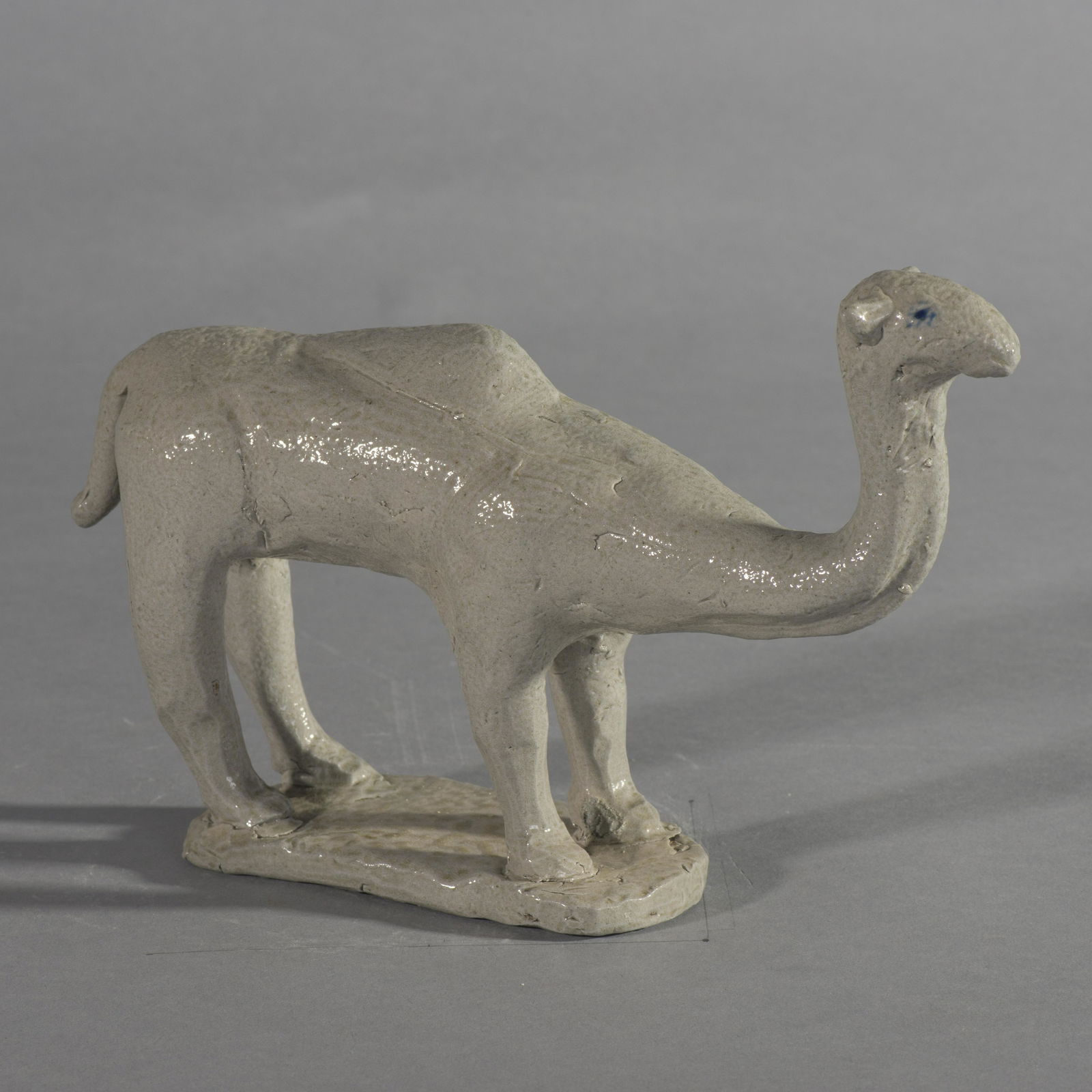 Charles Moore Camel salt glaze 1999: a salt glaze camel by Charles Moore signed on bottom Charles Moore 1999. condition is excellent. H 6.5" and length is 7.5". Charles Moore, (1935 -2007) Jugtown, NC