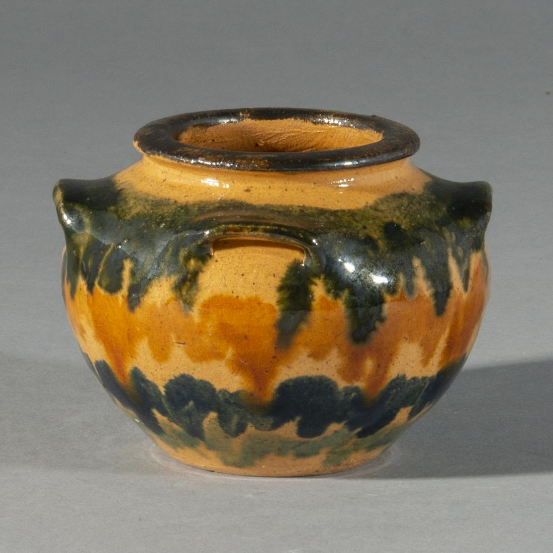 Billy Ray Hussey miniature jar: a small 3" multi glazed four handled jar signed BH on the bottom a great thin turned piece of pottery.