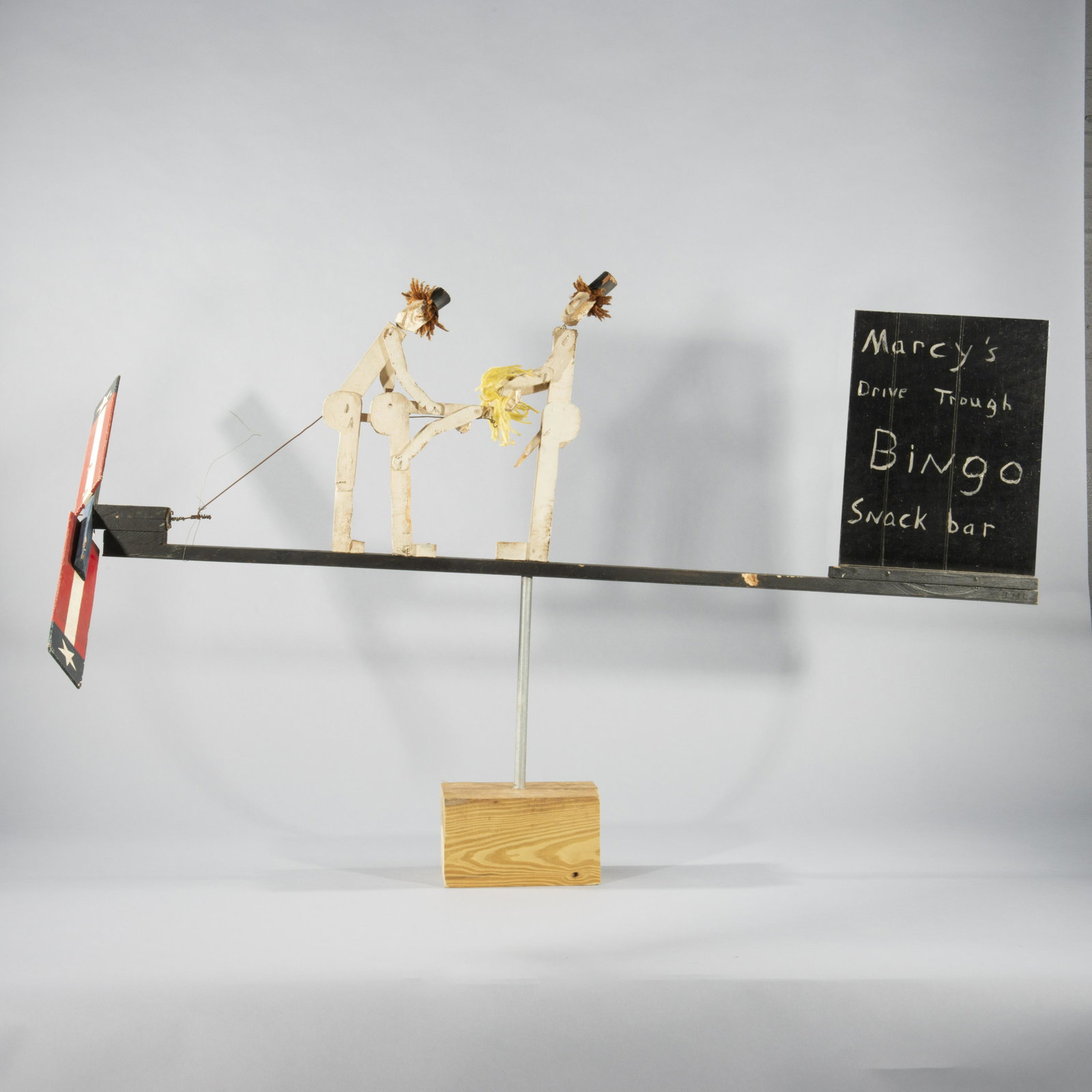 Folk Art Erotic Whirligig: a fantastic folk art whirligig with an erotic scene. Marciys Drive Through Bingo snack bar. 2 men in top hats. With a bent over woman. Very large. H 19", L 58"