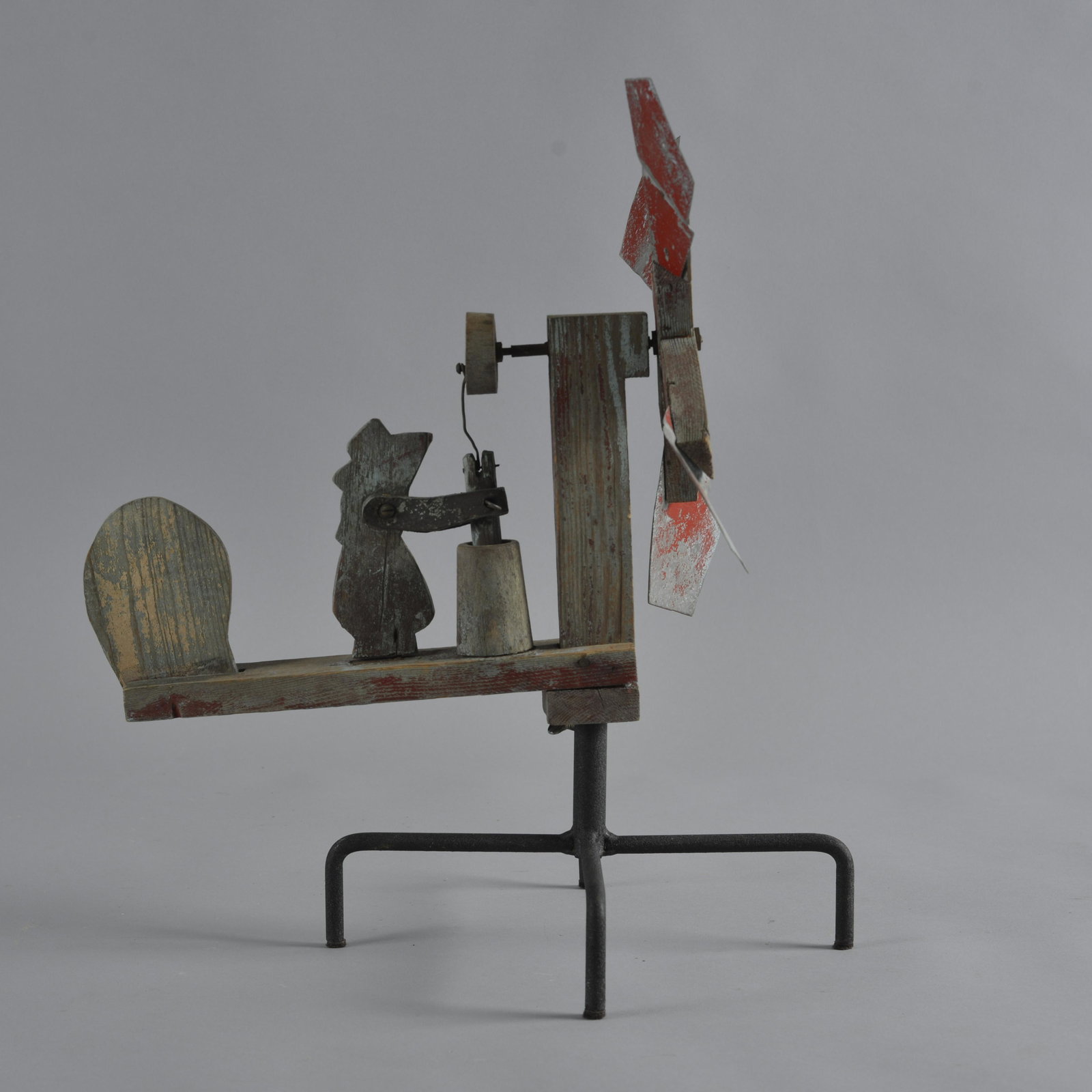 Folk Art Painted Whirly Gig: a fantastic whirligig with old paint. Very nice carved figure at a churn. 100% surface and great paint. Height 17", length 11"