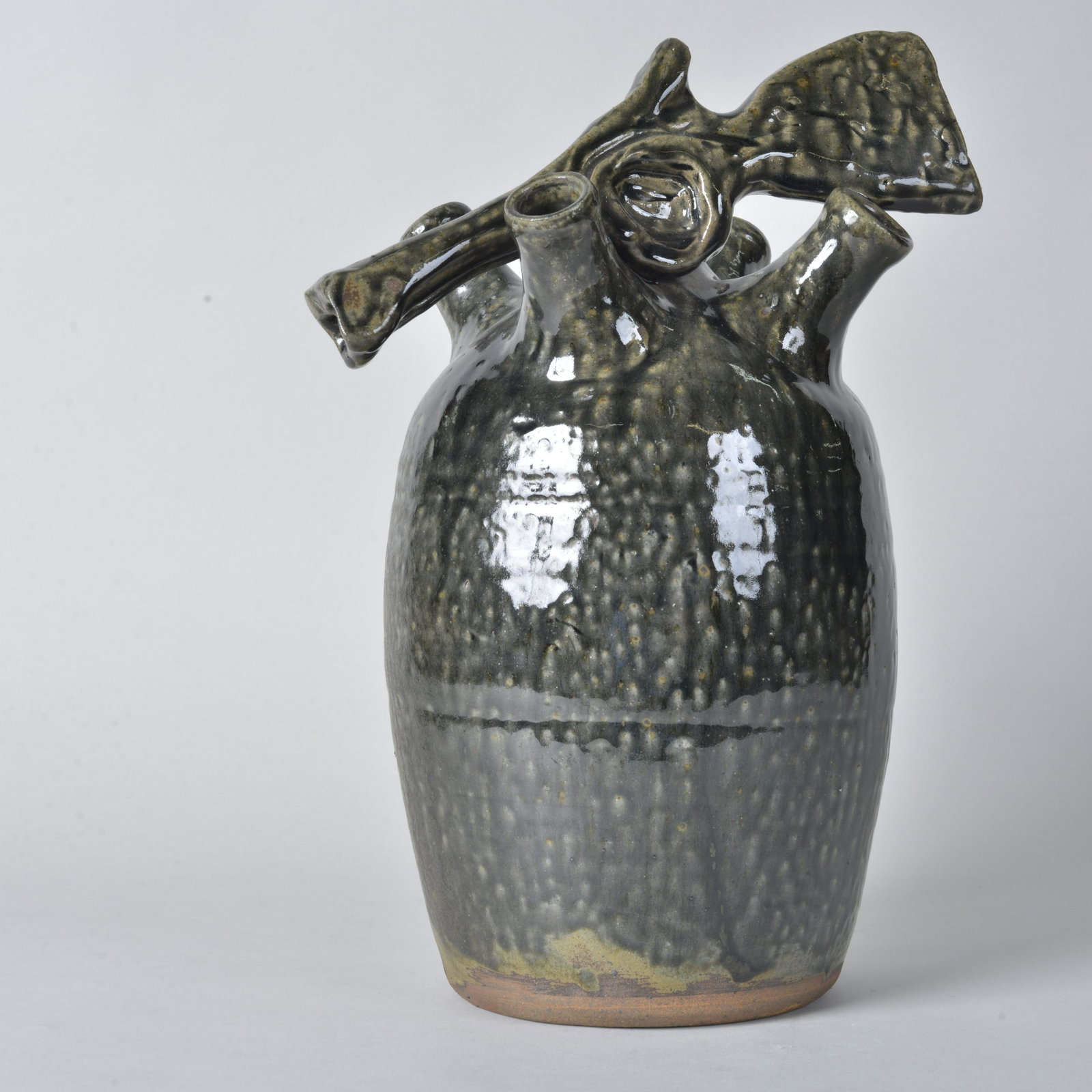 CJ Meaders Wedding Jug (shotgun wedding): CJ Meaders wedding jug with a shotgun for a very folky piece of pottery symbolizing a "shotgun wedding". a great piece of folk pottery. height 13"