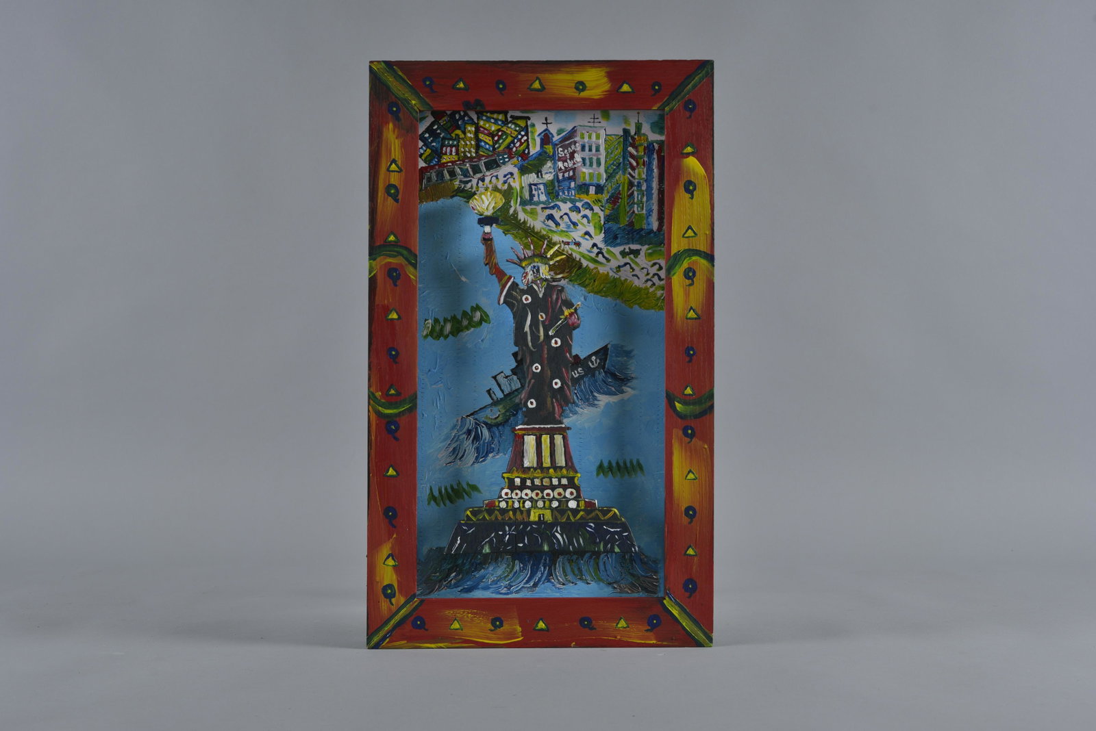 Folk Art Statue of Liberty by Wade Ledbetter: cut out wood and painted, applied to folk art made frame. Frame painted. Wade Ledbetter - Elon, NC - born Dec 31 1951 - 23"x14"