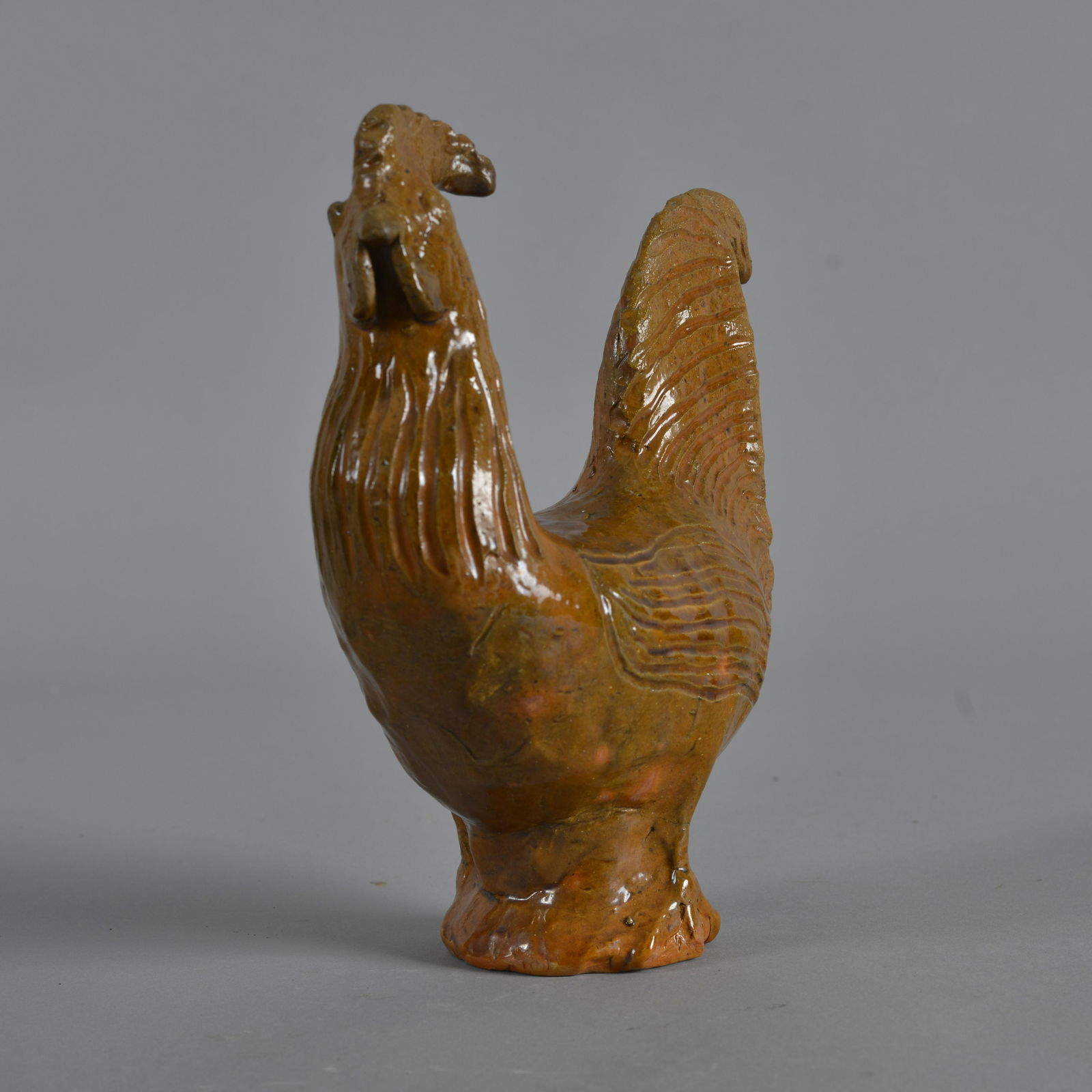 Charles Moore Rooster 1999 (orange): in the jugtown orange glaze. Signed Charles Moore dated 1999. height 9". Also signed 1-K