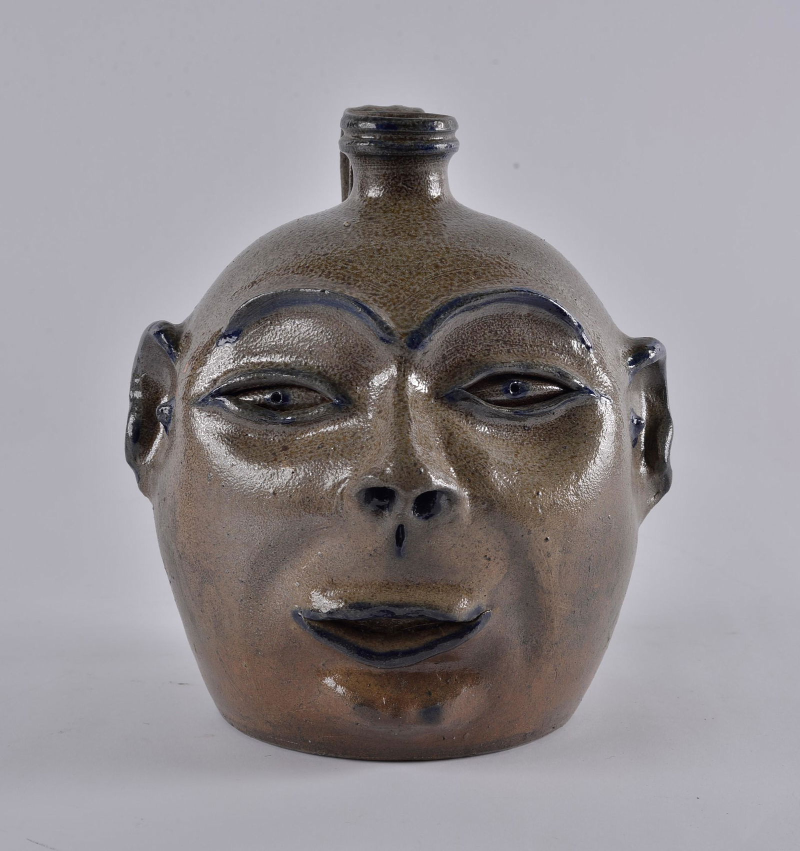 Billy Ray Hussey Face jug no teeth: kiln 53 signed bh. Salt glaze cobalt blue. H 10"