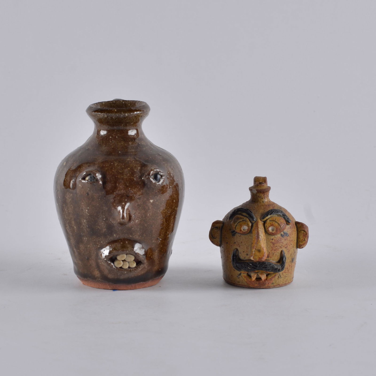2 North Carolina Miniature face jug (1 of 3)