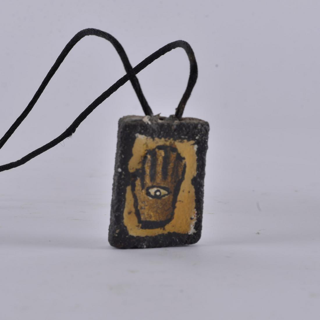 Mr. Imagination carved stone necklace (1 of 4)