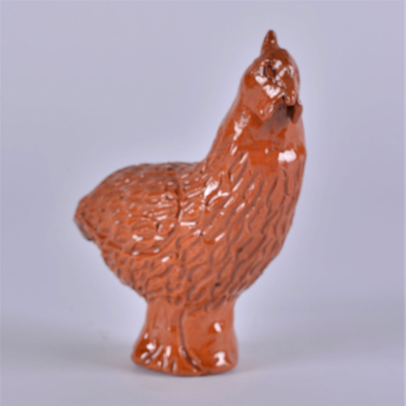 Charles Moore Jugtown Orange Chicken: excellent Jugtown Organge glaze. Great detail in the incised lines of the chicken. dated 1995, height 8"