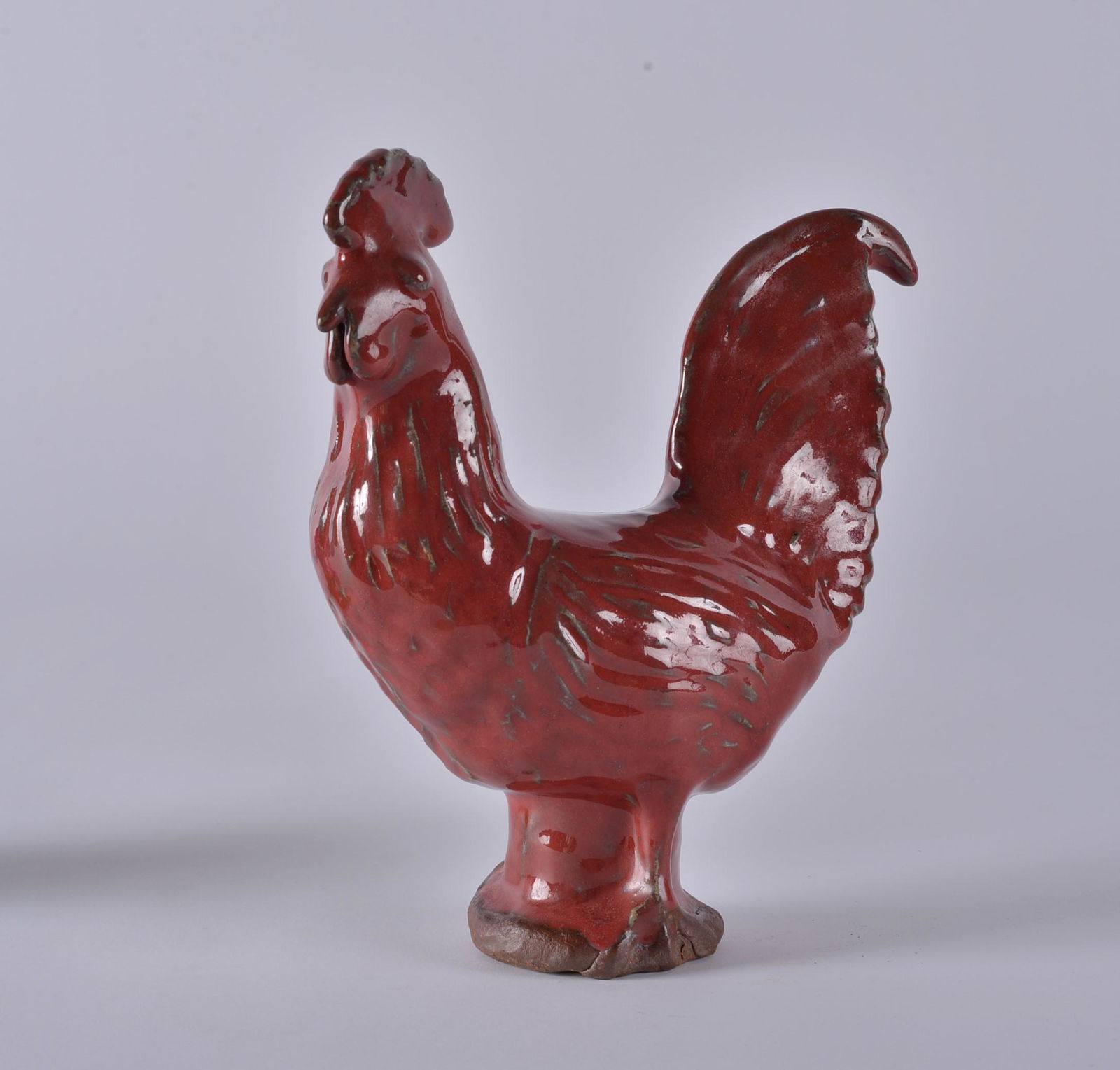 Charles Moore Rooster (red glaze): red glaze with blue green highlites. Stamped jugtown on bottom signed charles moore 1995