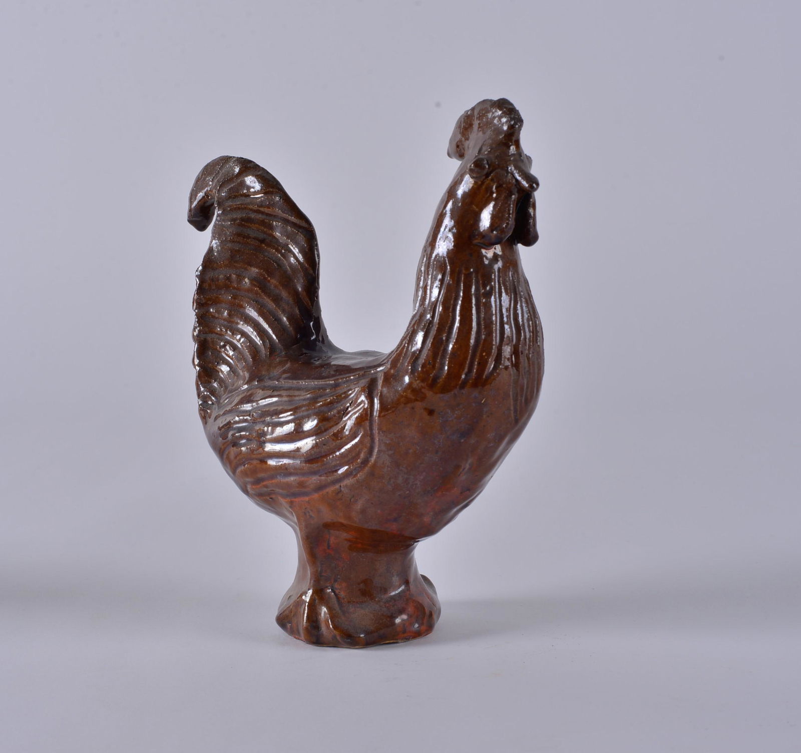Charles Moore Rooster (brown glaze): heavy glazed bottom. Lots of grinding post kiln fire. The marks are covered. See photos for details. 100% Charles Moore Hand. Height 8"