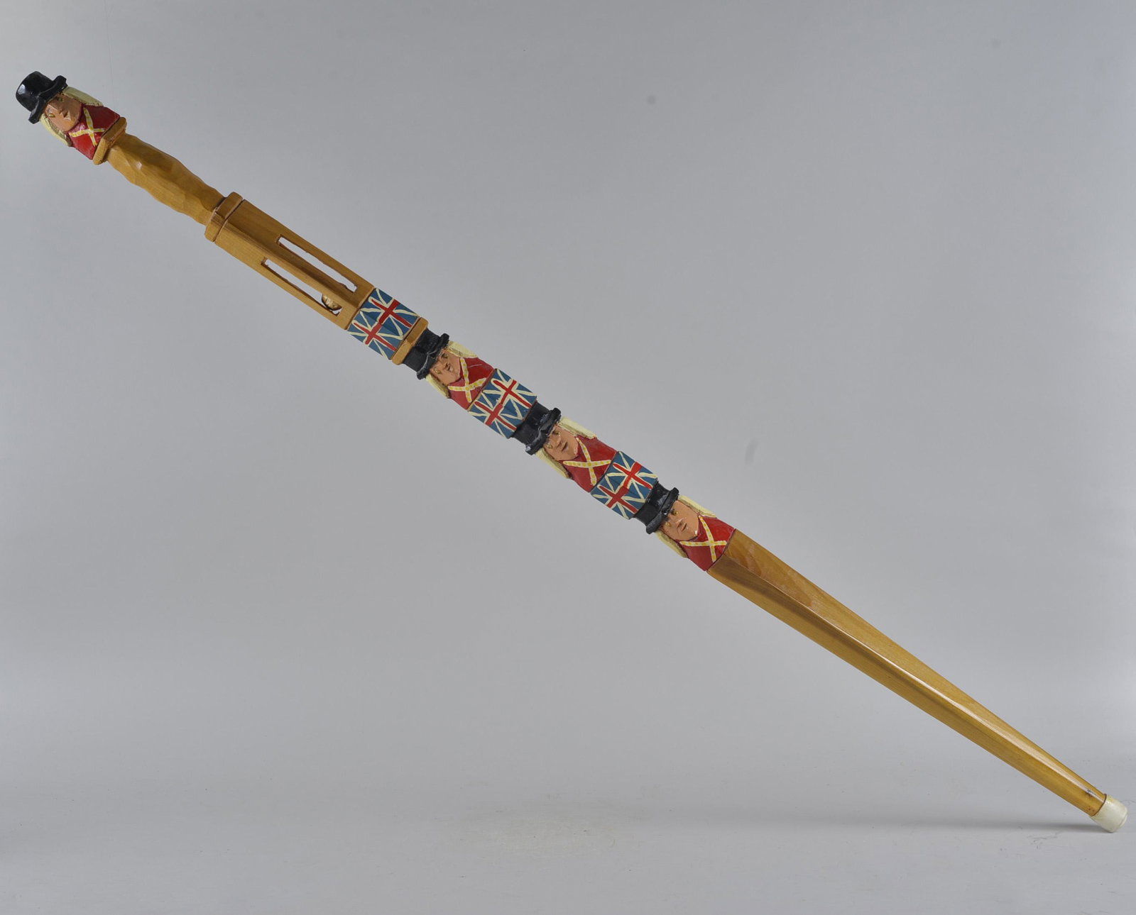 Buddy Fisher Folk Art Cane: Carved and pained folk art cane by Buddy Fisher. British flag and soldiers. L 50"