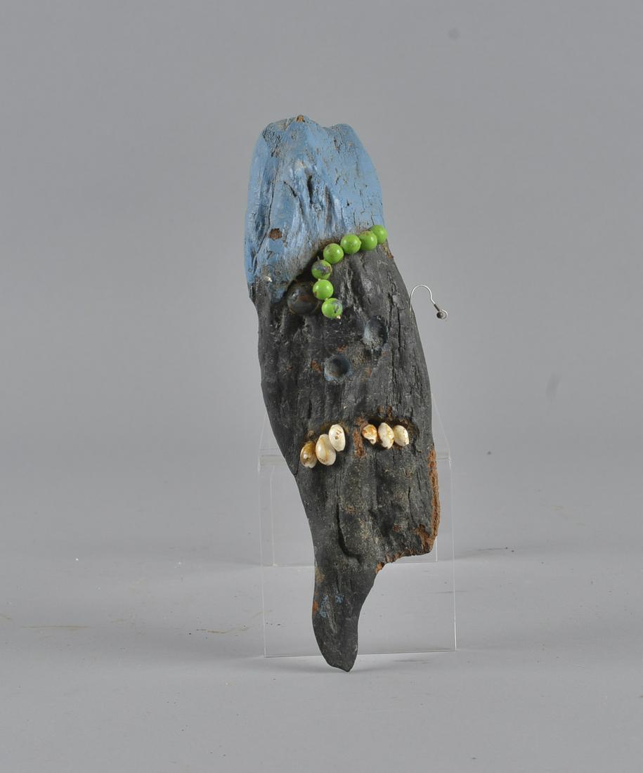 Bessey Harvey Root Sculpture: Bessie Harvery Root face with paint and beeds. Sea shells for teeth 11" tall