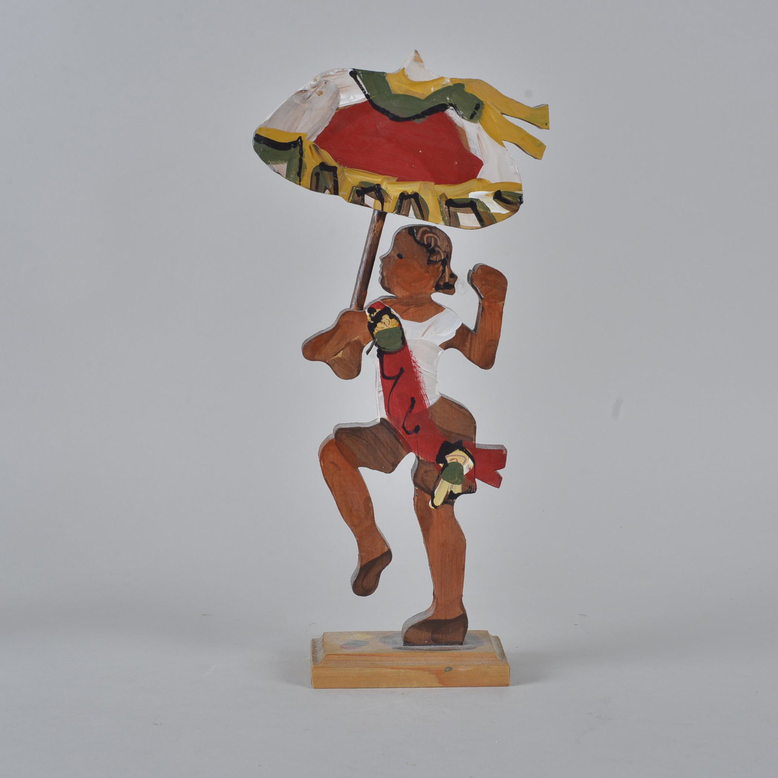 Lorranie Gendron Wood Cut Out: Lorranie Gendron 2nd Liner w/ Umbrella. Cutout wood and paint. Height 14.5"