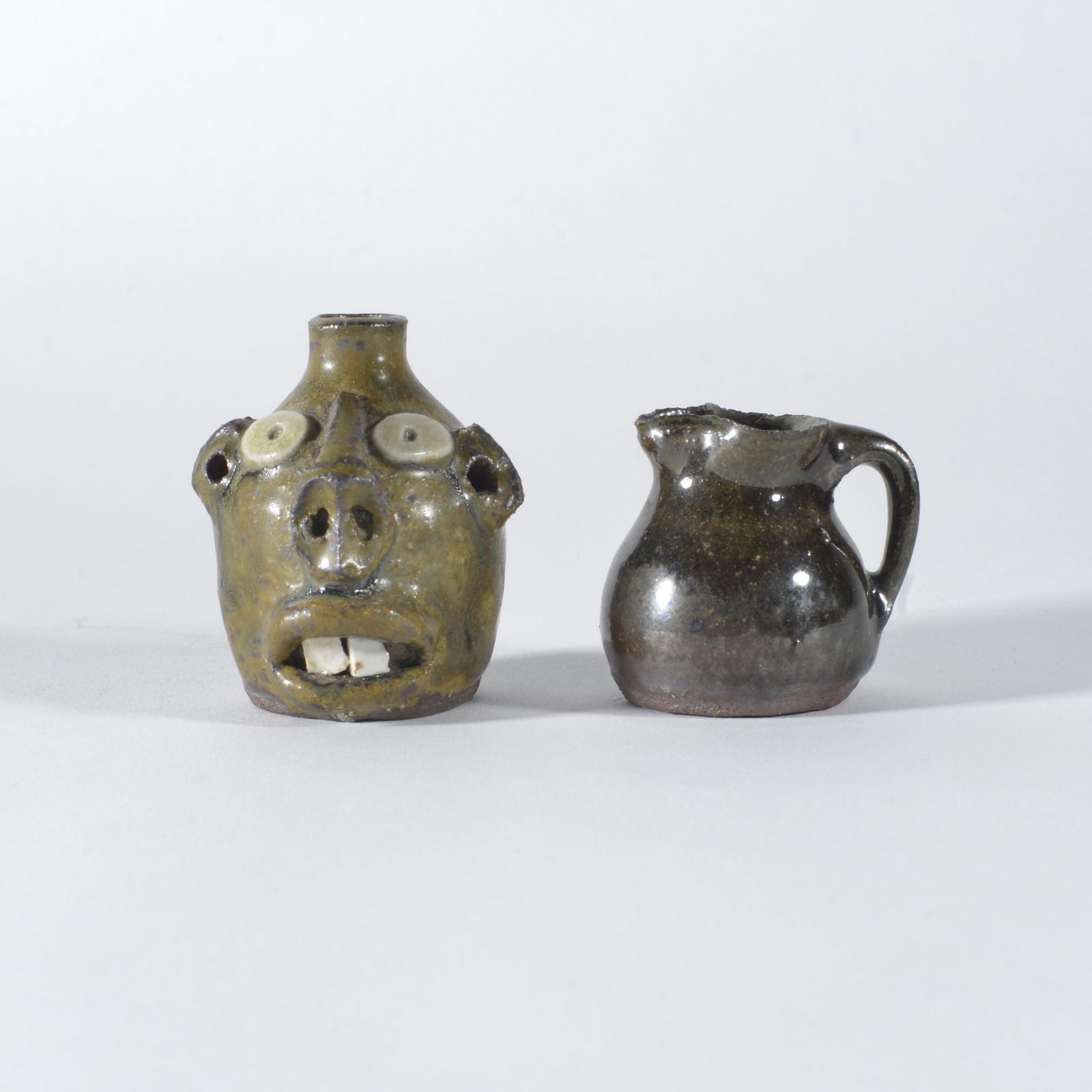 Wayne Hewell Miniature Face Jug and Pitcher (1 of 4)