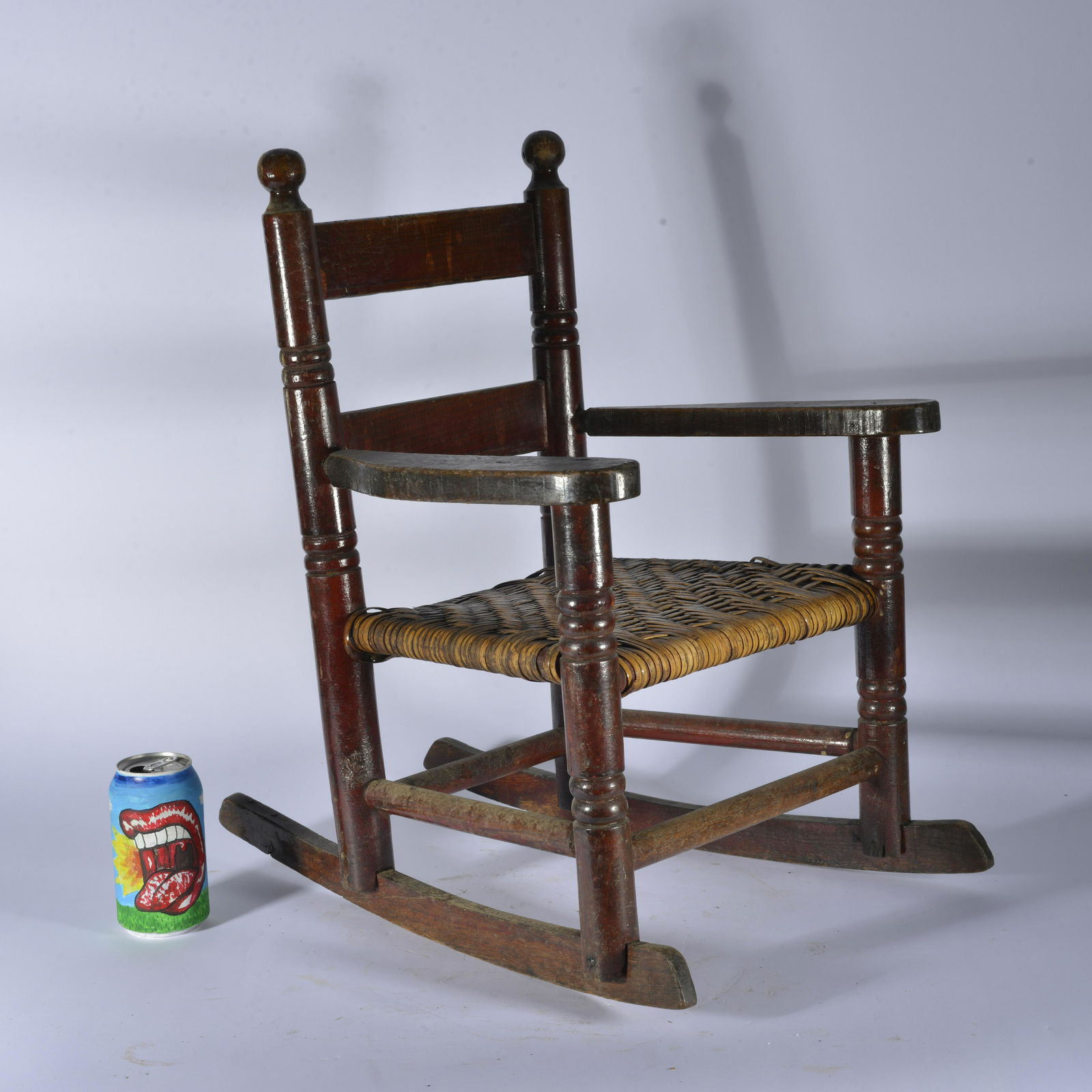 Miniature Rocking Chair: wood and cane bottom. height 22"