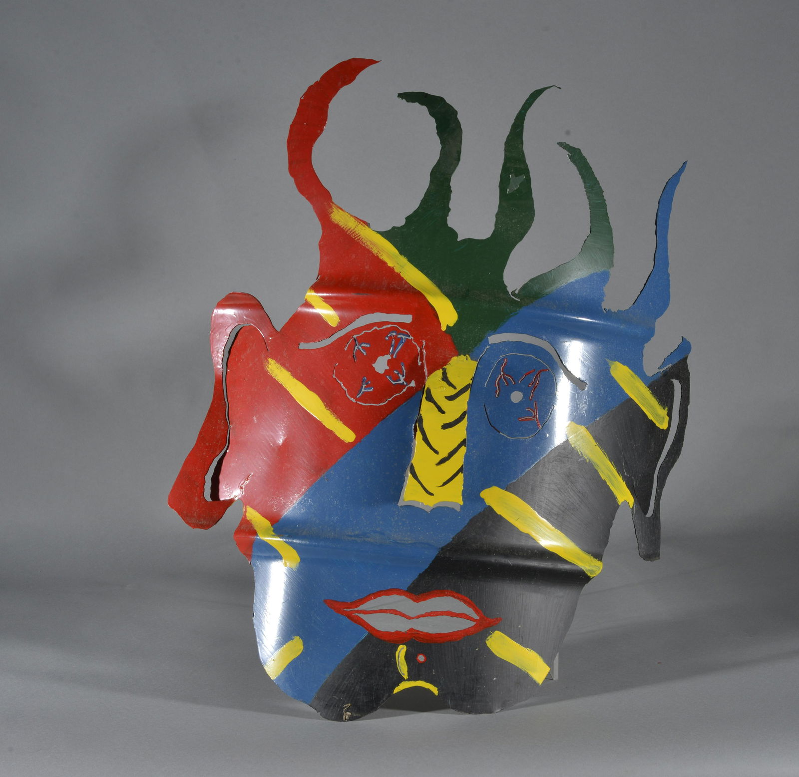 Folk Art Metal Mask: metal and paint. 31"H x 20"w