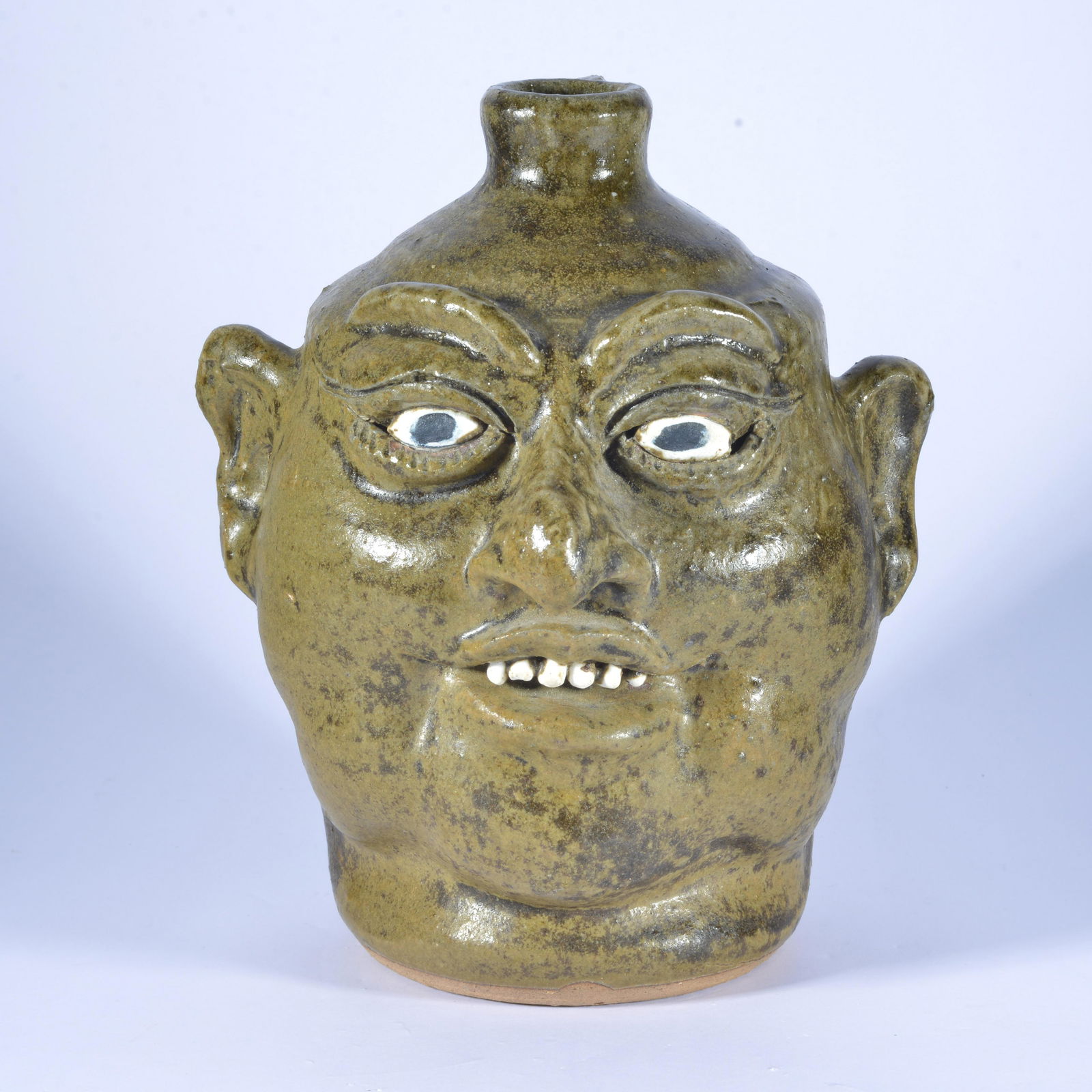 Lanier Meaders Face Jug: clay teeth, clay eyes. a fine example of Lanier's work. height 9"