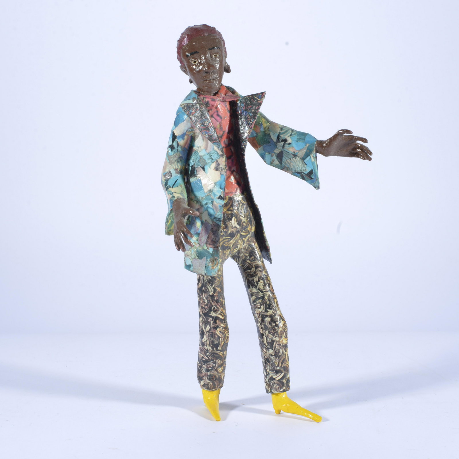 PATRICK DAVIS: wood and plaster painted black man. 11"H