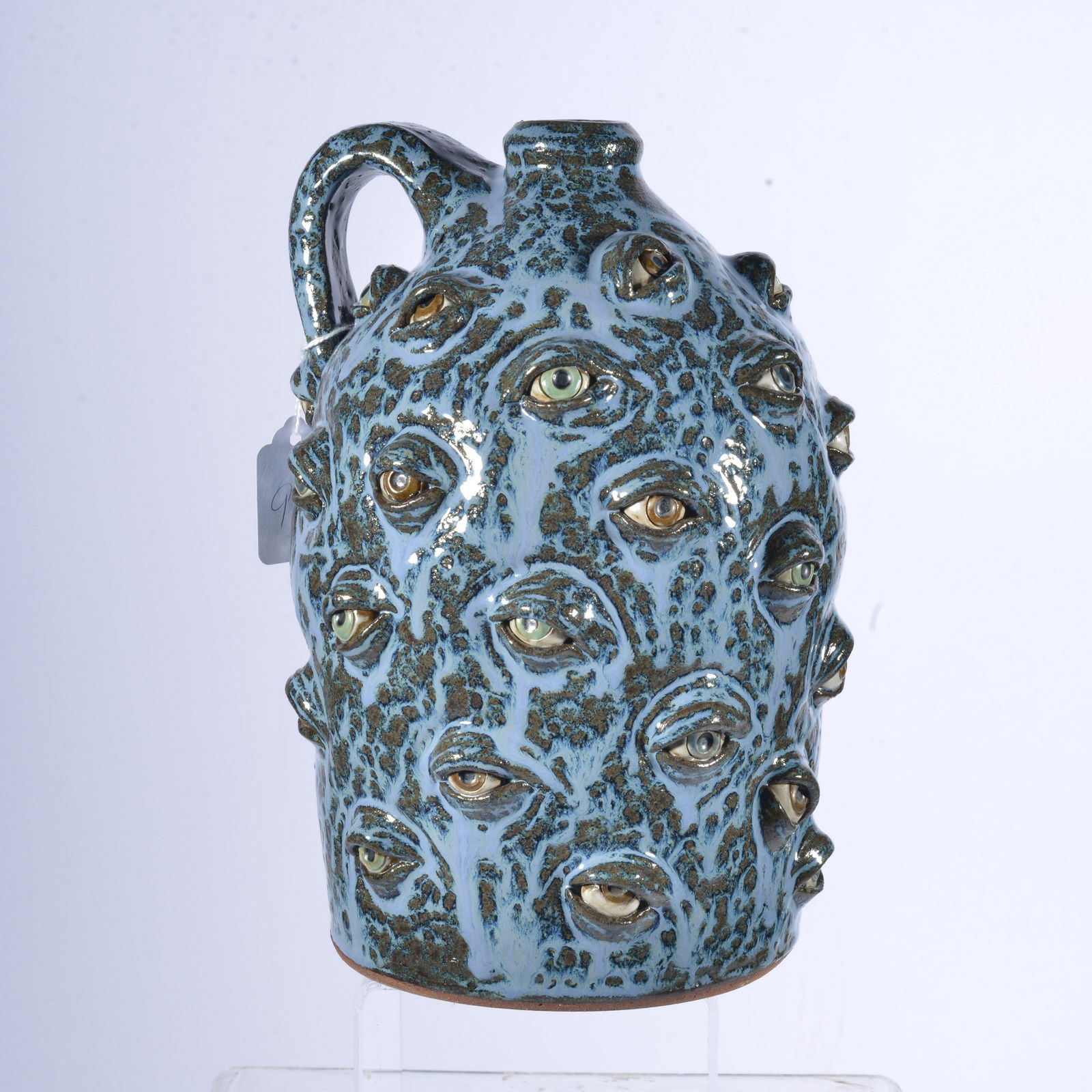 LYNN & ALBERT W MULTI-EYE FACE JUG (1 of 4)