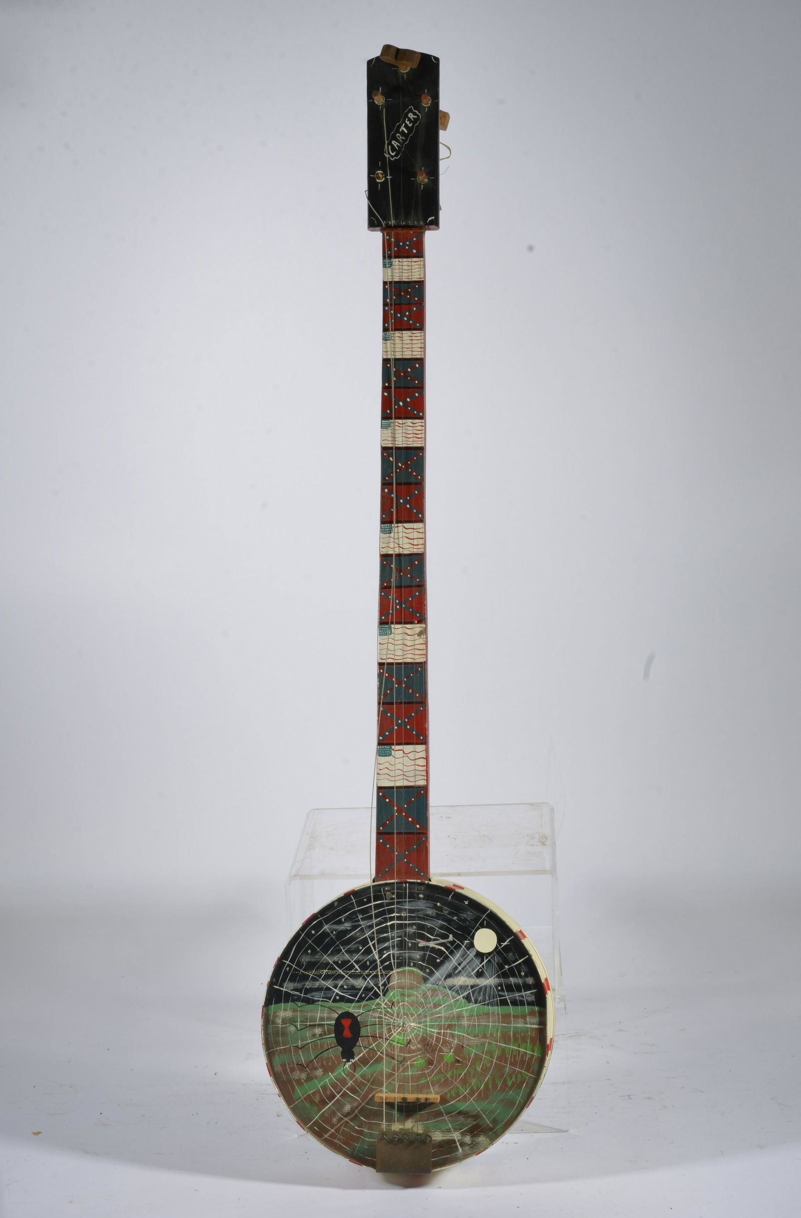 BENNY CARTER (1943 - 2014) BANJO: oil based house paint on homemade banjo by Benny Carter. Ca. 1995. sold in 2021 and reconsigned by the buyer. This is one of Benny's best banjos. There are a hand full of these out there, this one is