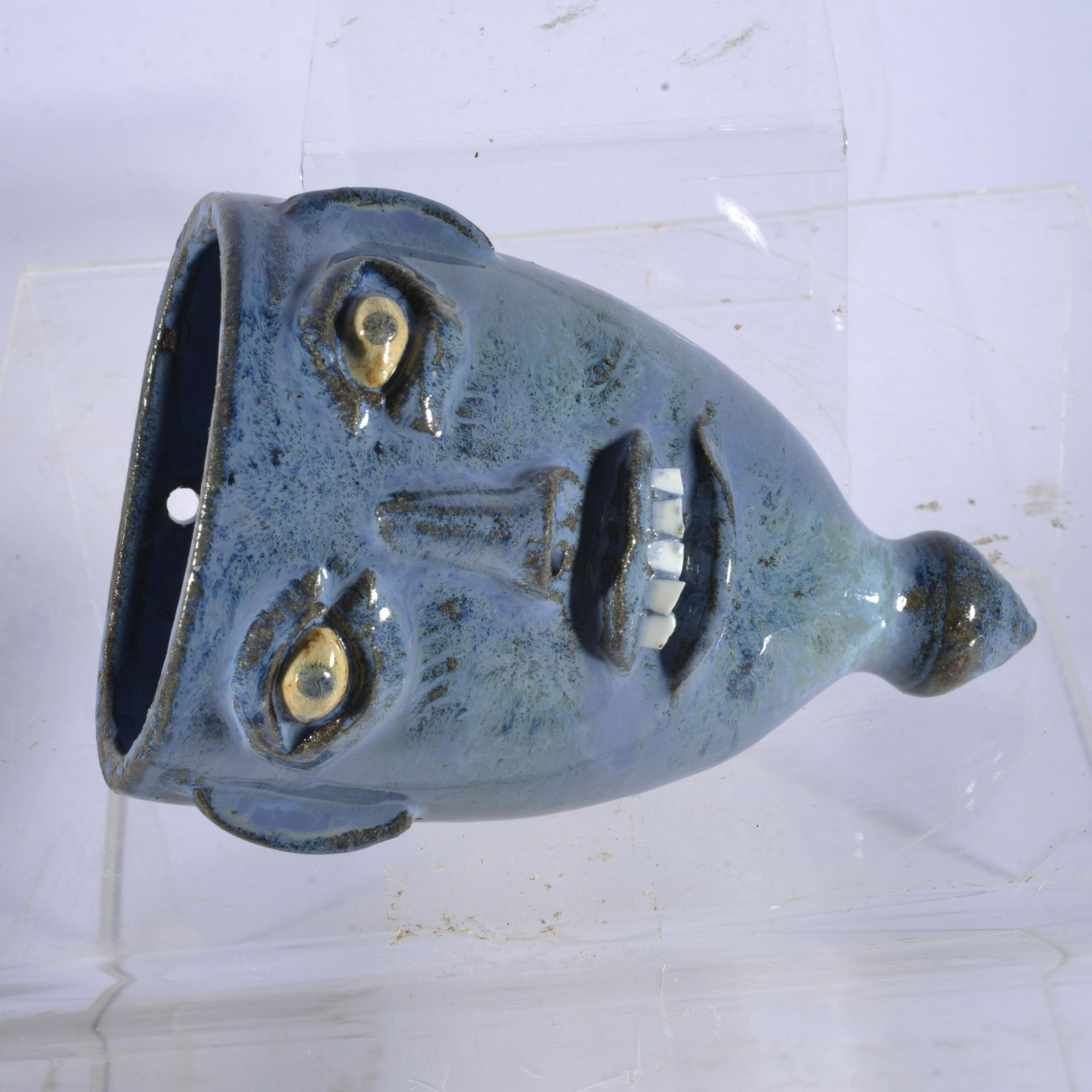 WALTER FLEMMING BLUE GLASSY FACE WALL POCKET (1 of 2)