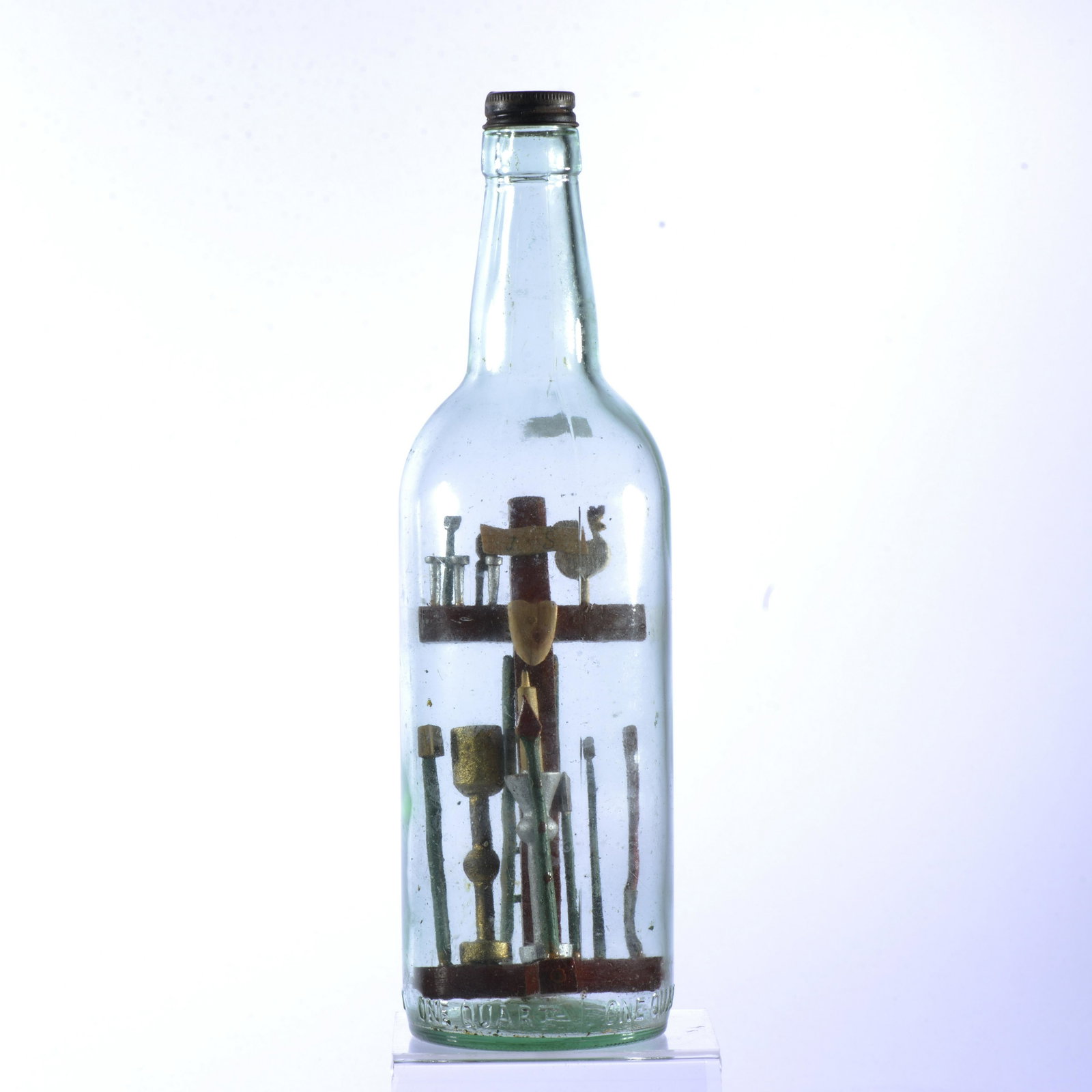 FOLK ART BOTTLE ART: paint and carved wood inside bottle. 11.5"