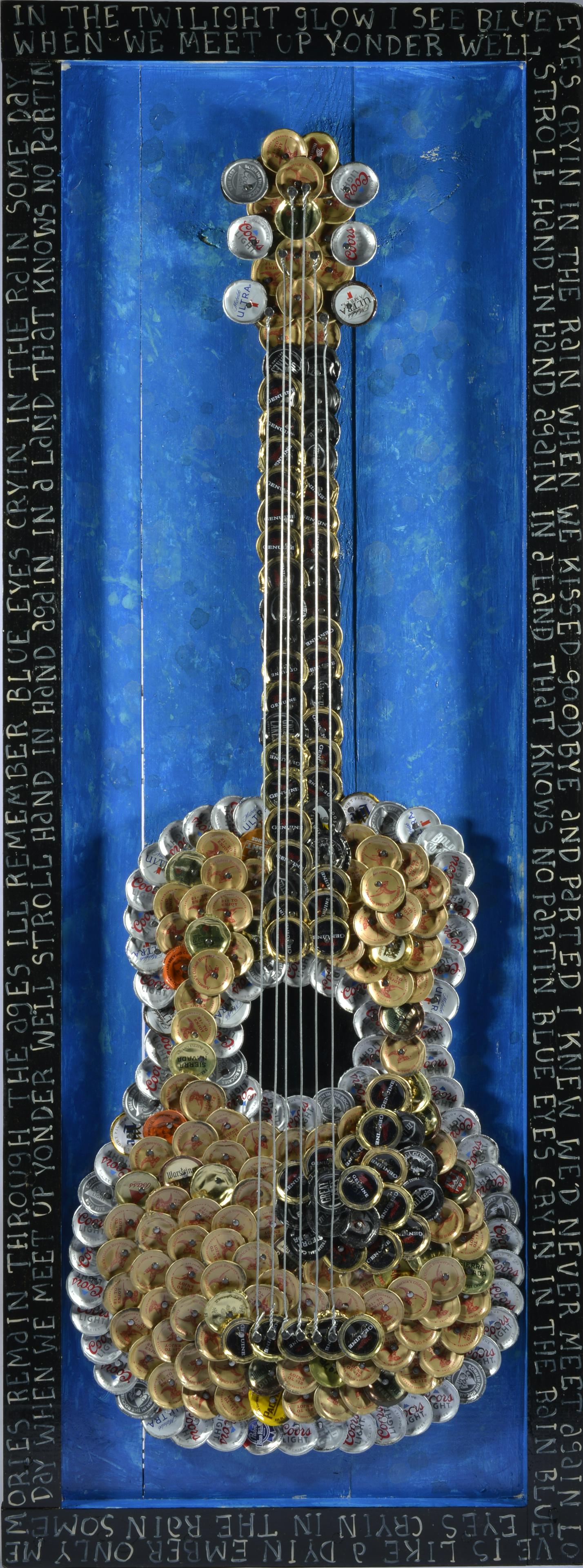 ERIC CUNNINGHAM FOLK ART guitar: a very intense eye pleasing piece of art by Eric Cunningham. wood and mixed media assemblage with paint. 14.5" x 40"