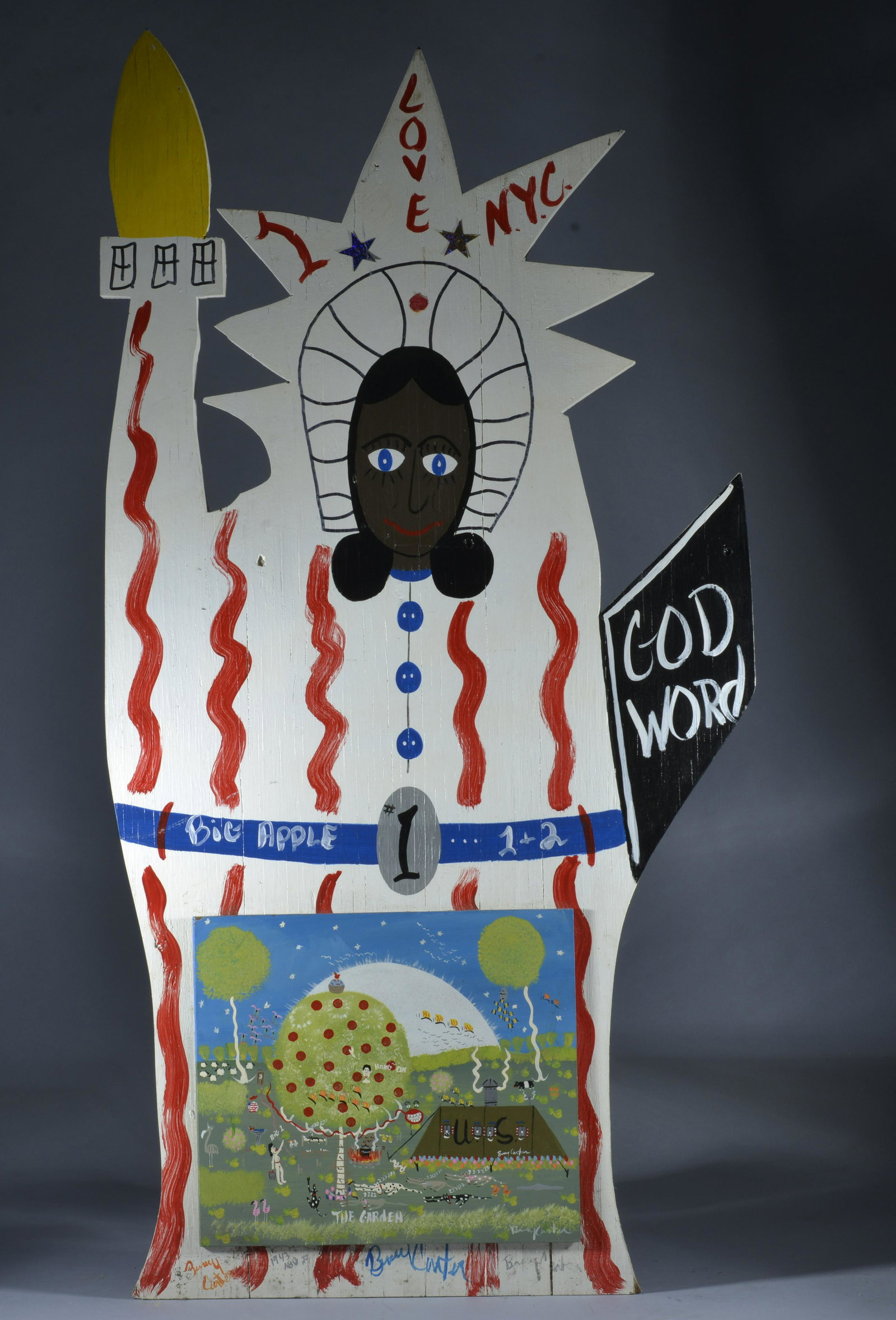 BENNY CARTER (1943 - 2014) wooden cutout statue of liberty: a rare painting attached to the cutout of the statue of liberty with black face. The small painting on board applied to the statue by the artist. 24.5" x 47" overall and the small painting inside is 1