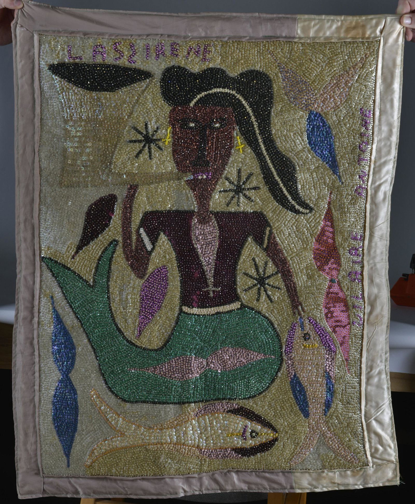 HATIAN VOODOO SEQUIN FLAG: signed at top Lassirene. Bead work. 27"x36"