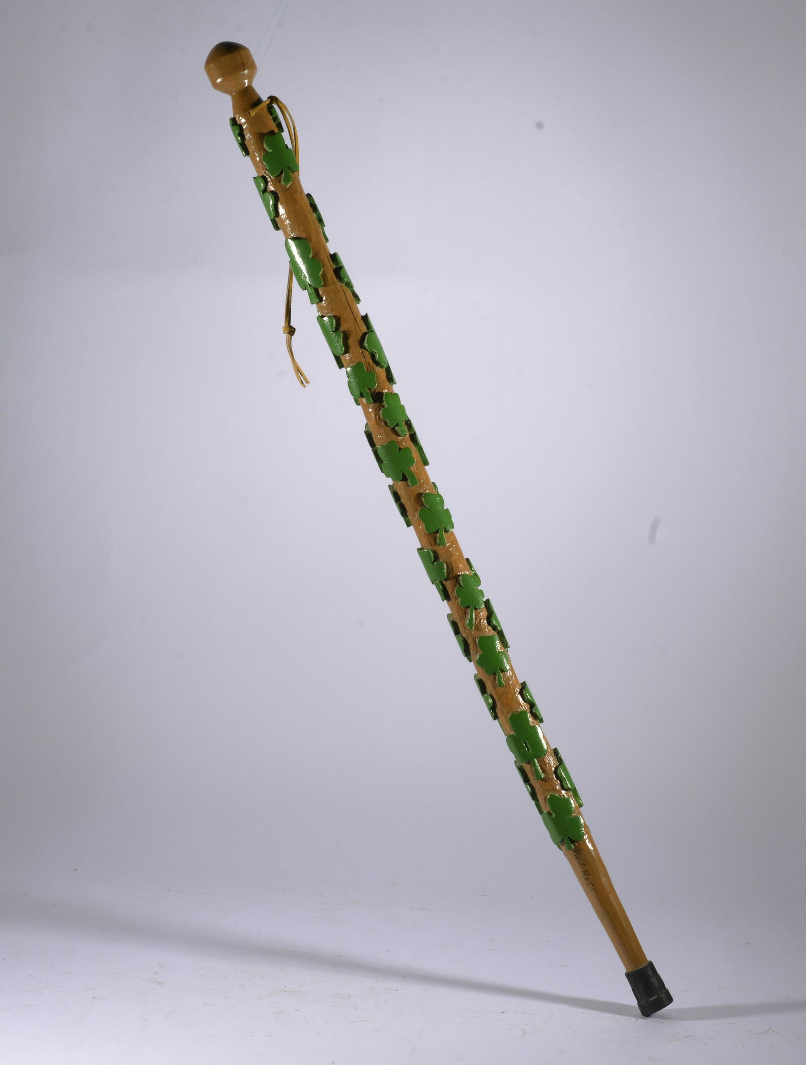 FOLK ART CARVED CANE WALKING STICK: carved and painted cane. Clovers. 37.5"