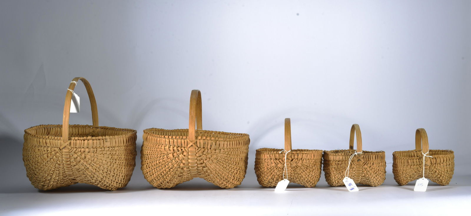 GRADUATED SET OF OAK SPLIT BASKETS (1 of 5)