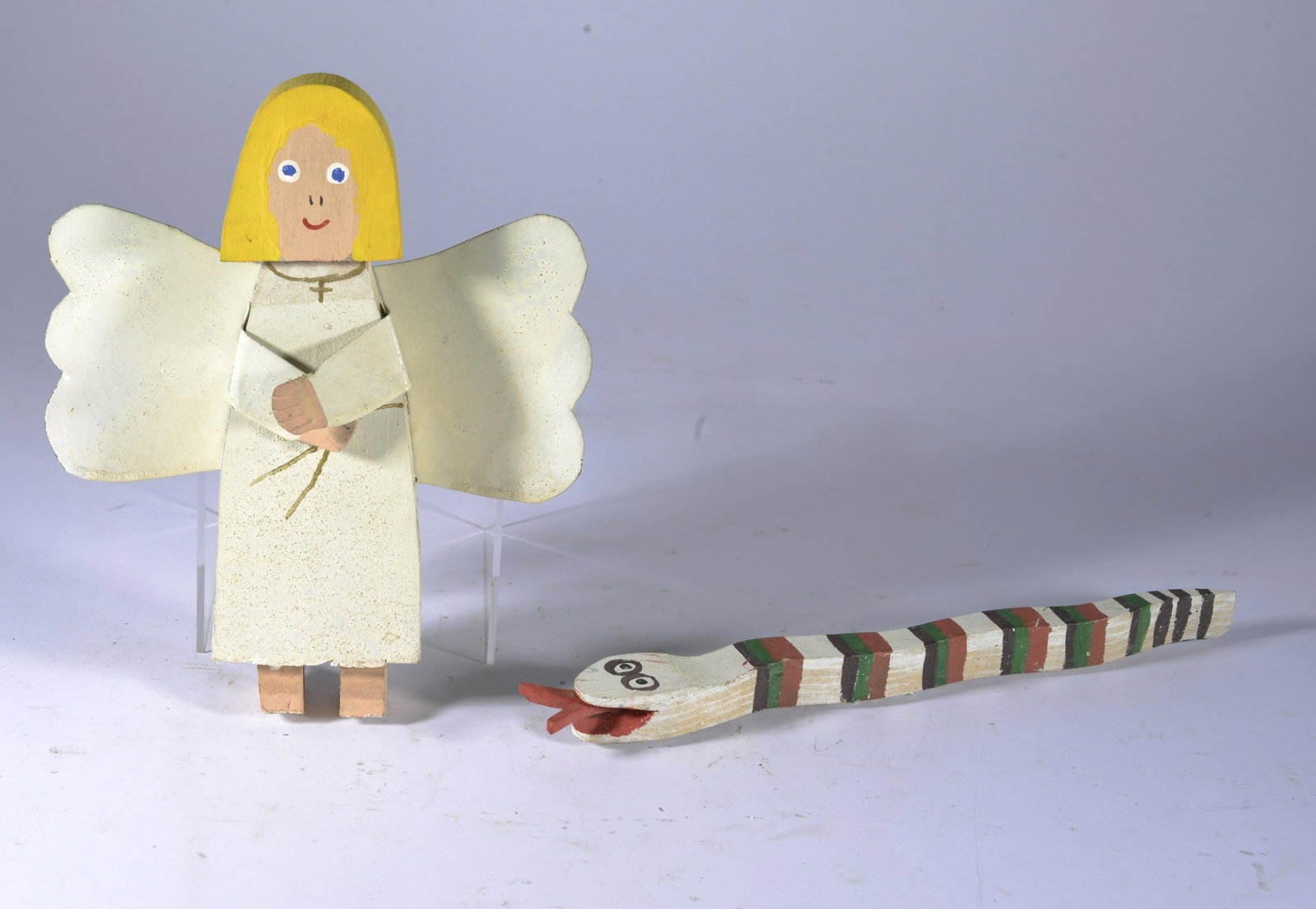 TUBBY BROWN FOLK ART GROUP: SNAKE AND ANGEL, WOOD, PAINT, SNAKE IS SIGNED. Angle 8.5", Snake 11"