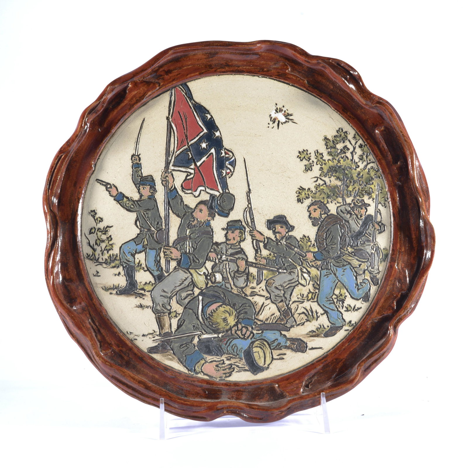 RODNEY LEFTWICH CONFEDERACY EMBOSSED PLATE NC POTTERY: In this pot, Rodney took a plate he turned & embossed Confederate soldiers onto the surface of the plate Signed on base Leftwich Pottery NC MTNS. 11.5" wide.