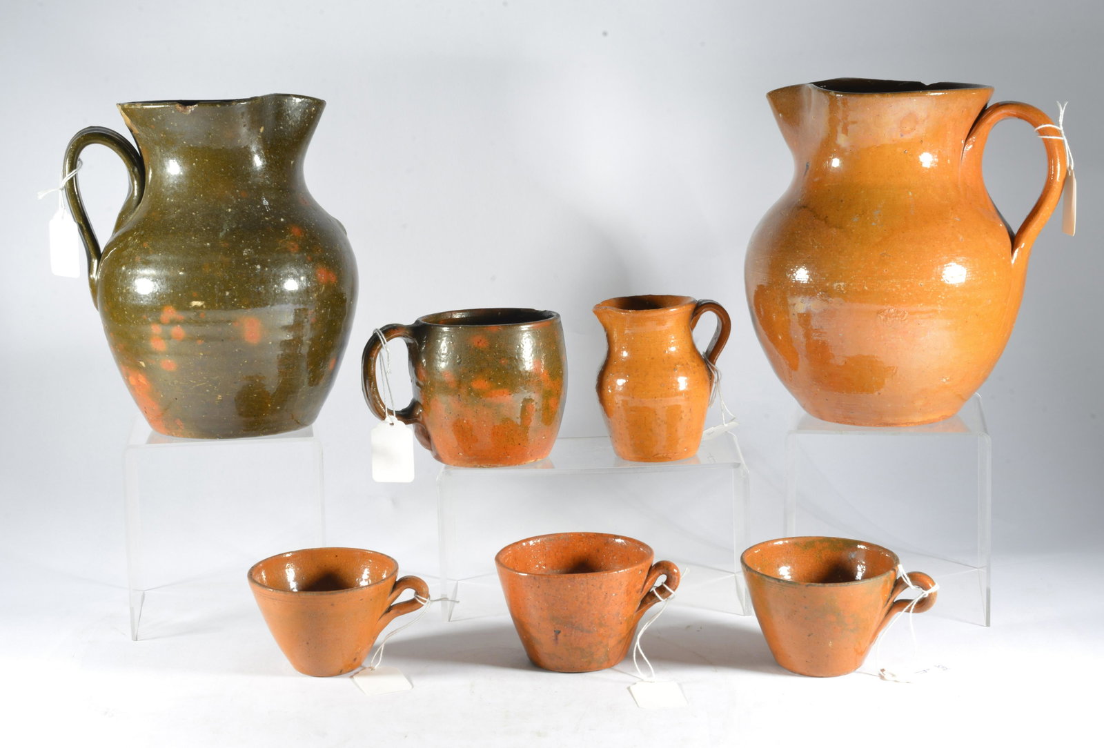 JUGTOWN POTTERY GROUPING, TRANSITIONALWARE, SEAGROVE NC: Old Jugtown pottery ca. 1920-50. Rims of pitchers have damage see pics. These are in some of their earliest glazes. Much would have been turned by Ben Owen. The pitcher on the left of the main picture