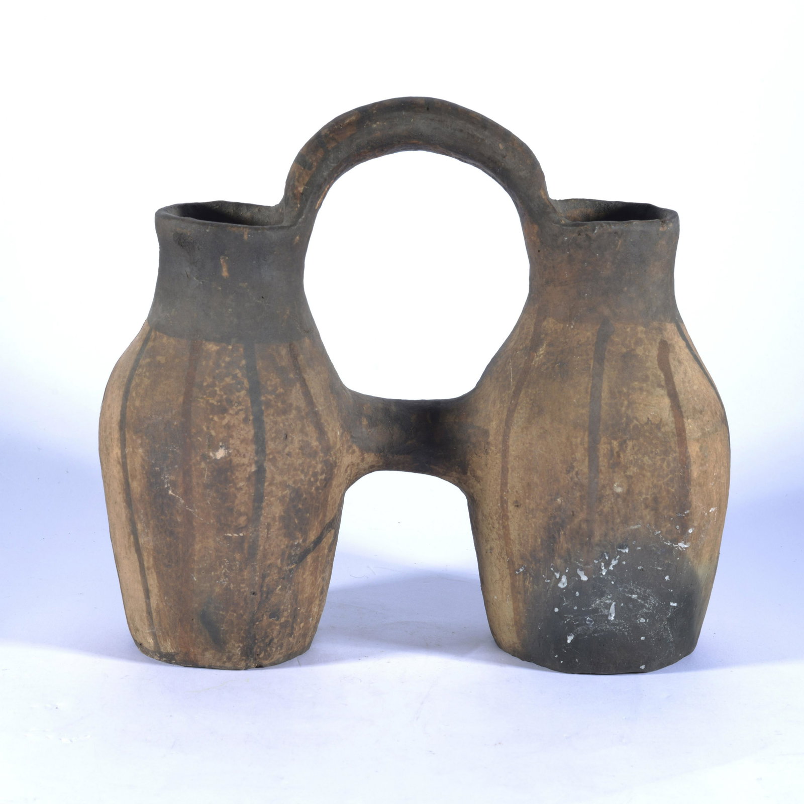 CENTRAL AMERICAN (MAYBE MEXICAN) CIRCA 1900-20 POTTERY DOUBLE JUG: Not signed. Pot was researched, but only suggestions from North American Native American from some experts was possibly Central America or Mexico. to have age on it. Stands 9" to top of handle and 10"