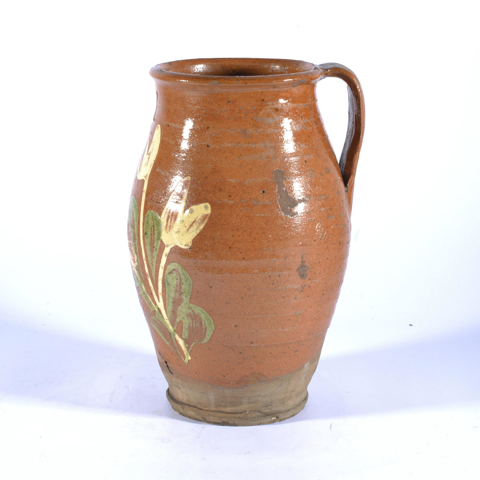 SPANISH 19TH CENTURY SLIP DECORATED PITCHER EUROPEAN POTTERY: Slip decorated (not applied later) 19th century definitely Spanish pitcher (region unknown of Spain). Stands 8.5" tall. One of the better recent European redware pots we have offered.