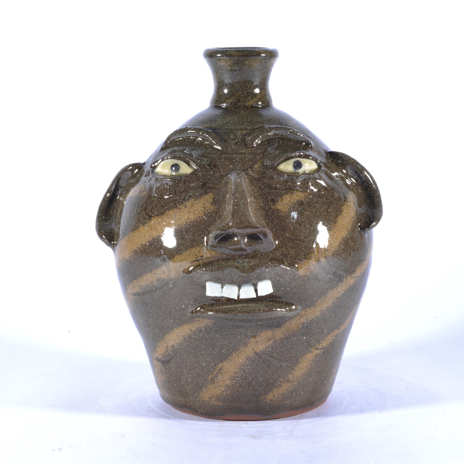 WALTER FLEMING EARLIER SWIRL FACE JUG: Even today, Walter (b1937) can create incredible pots. he is the Senior (and mostly active) Potter of the Catawba Valley. Walter has a wonderful timber property where he digs some of his clay that has