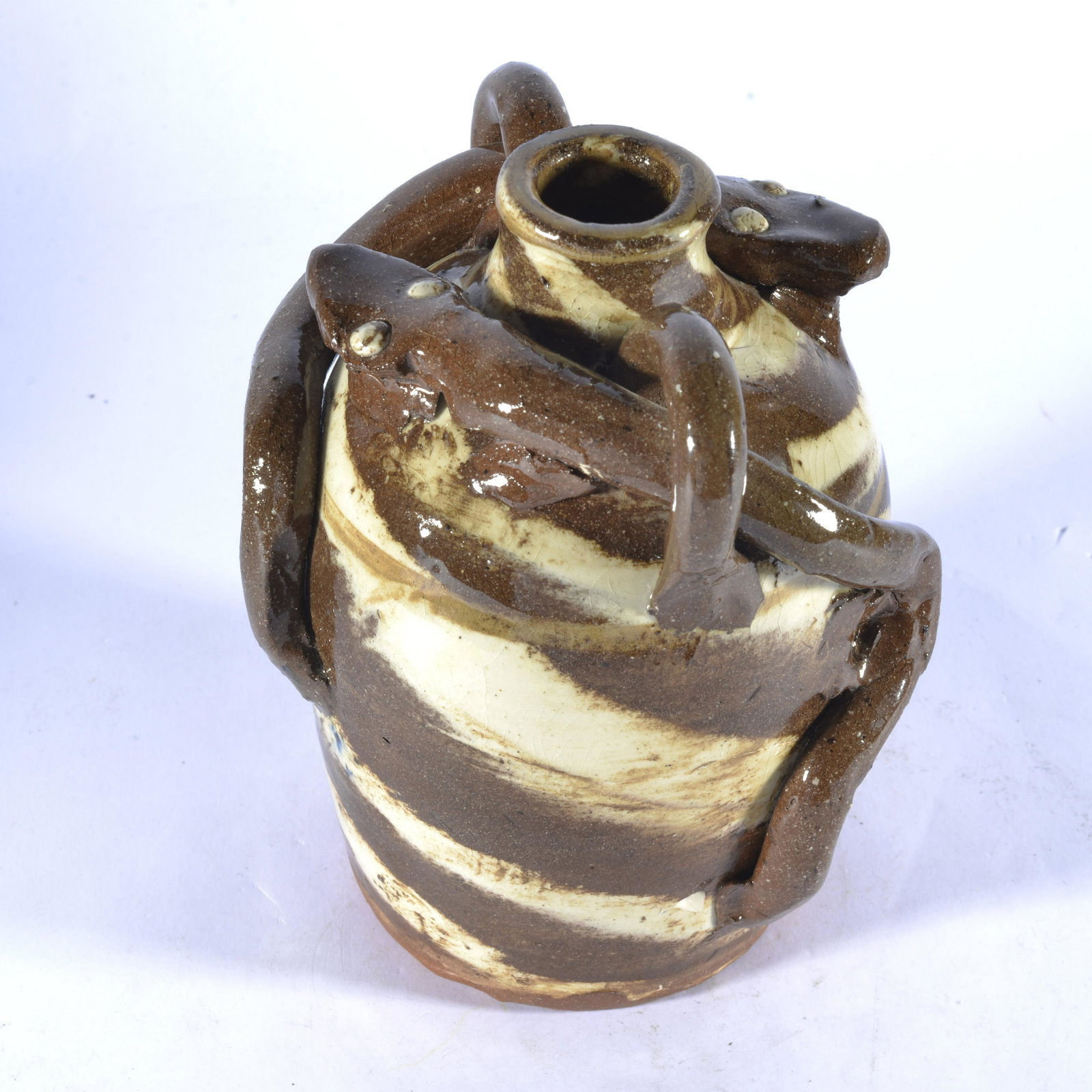 BURLON CRAIG DOUBLE SWIRL SNAKE JUG: Swirl pottery, double snakes, signed on bottom & marked w/ X. 6.5" tall x 5". Circa 1985 to early 90s.