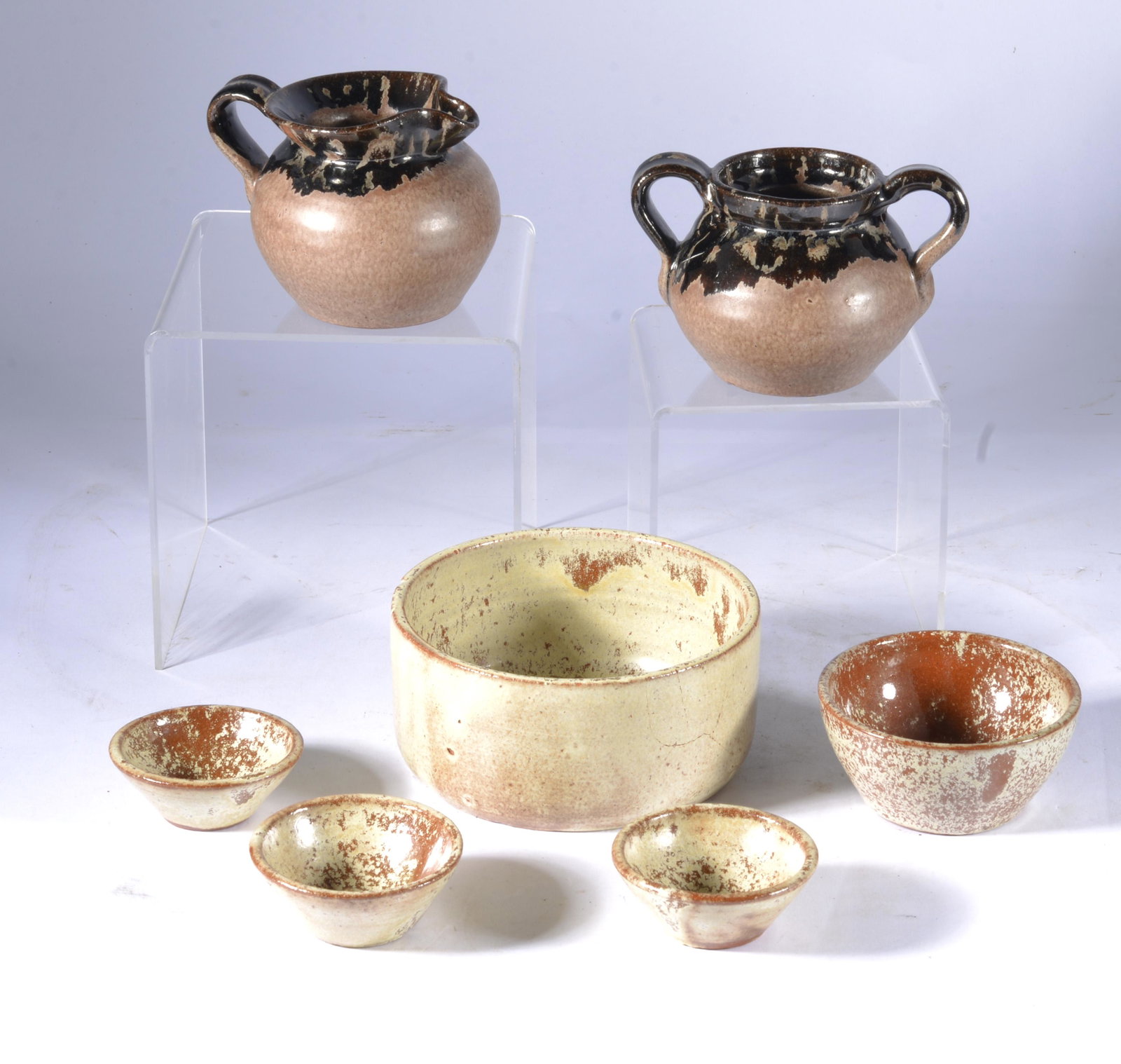 CELIA COLE & KENNETH COLE GEORGE GROUPING EARLY 1990s SANFORD NC: Larger pots are by Kenneth George, smaller by his great-aunt Celia Cole. And most signed on bottom. Brown-glazed examples are primarily 2.75" tall, largest bowl is 4.5" wide.