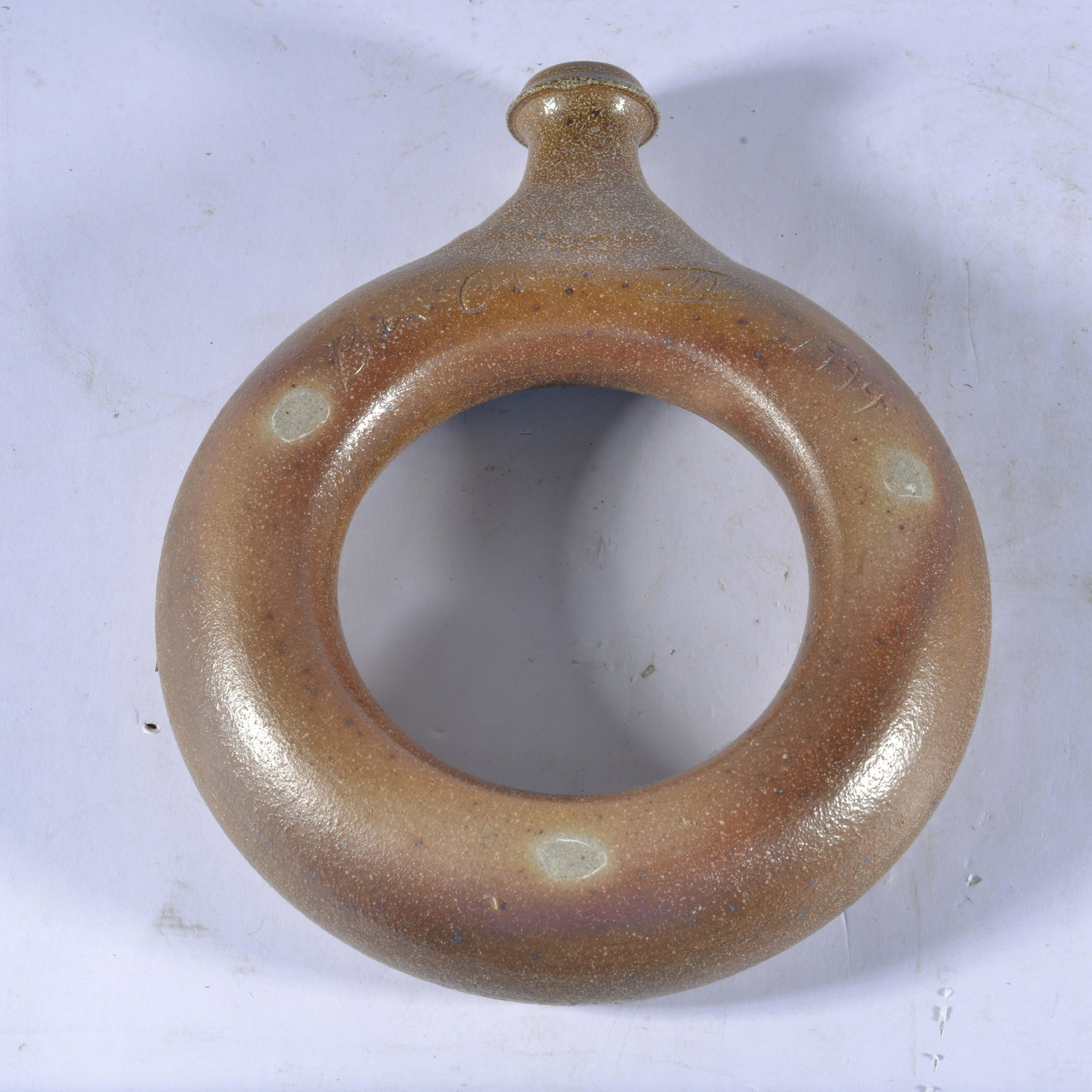 BEN OWEN III SALT GLAZE RING JUG 1999 SEAGROVE NC: Most ring jugs created by Ben were his from teenage years in the 1980s. This example is very unusual as he moved on to all sorts of glazes & forms by this point in his career. The ring jug is 9.5" in 