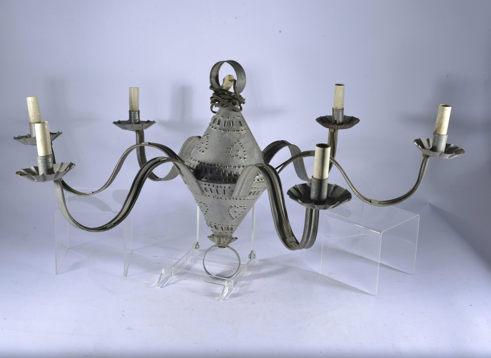Punched Tin Lighting: ca. 1970 coppied from colonial lighting. A great usable piece. 34" wide by 16" tall.