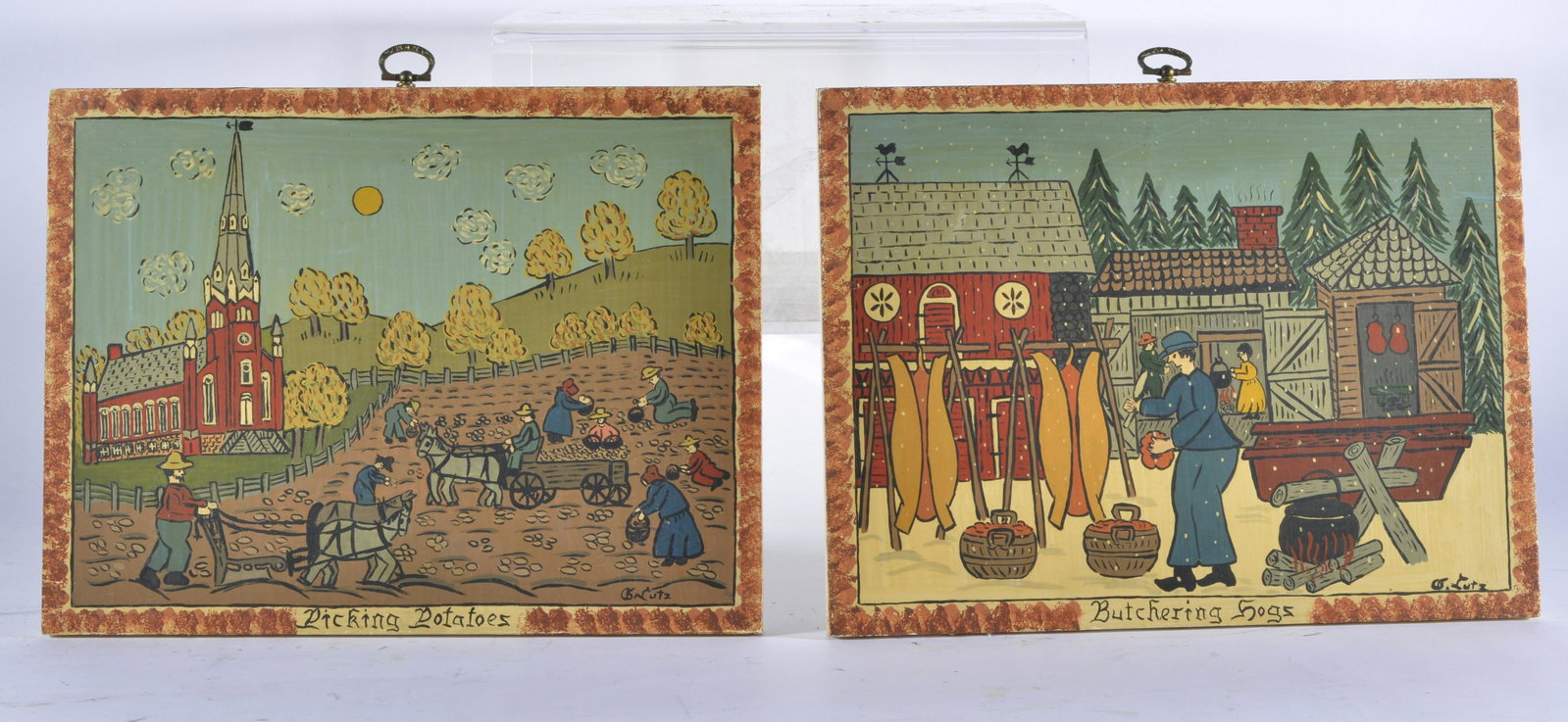 G LUTZ 'BUTCHERING HOGS' & 'PICKING POTATOES' PA DUTCH FOLK ART: painting on wood panels. Signed & titled. Both framed 9" by 12".